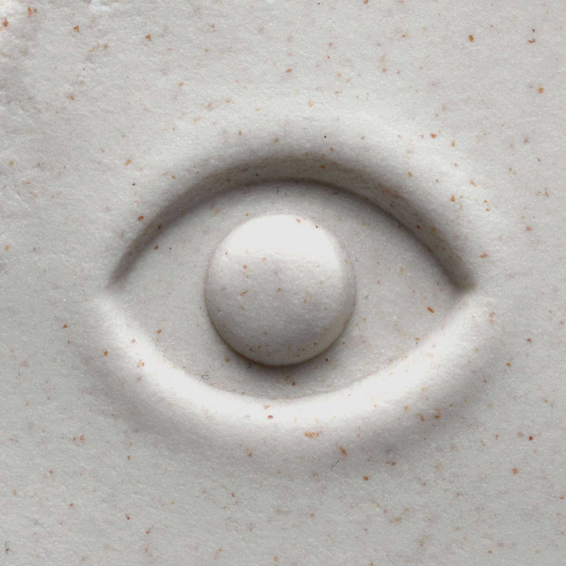 MKM Pottery Tools Medium Round Stamp - SCM-100, Eye applied to clay
