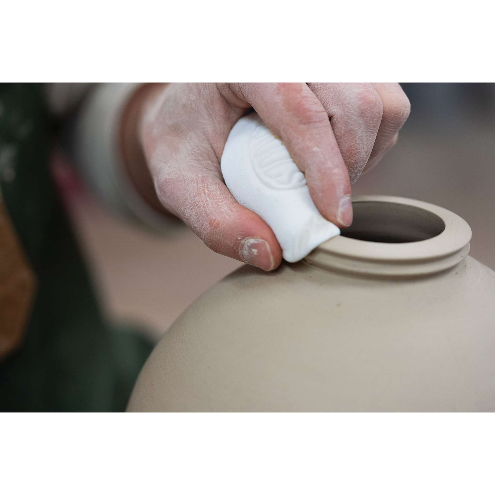 Mudtools Mudsponge - White Finishing smoothing rim of completed clay vase project