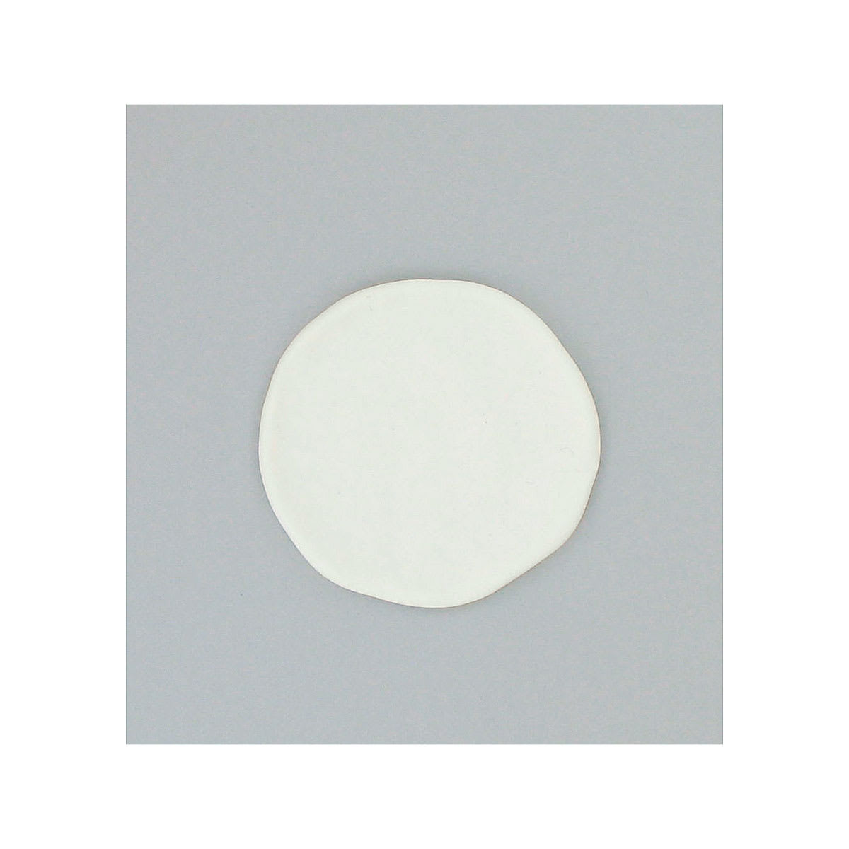 Sculpey UltraLight Clay - Top view of clay pressed flat into a circle Sculpey UltraLight Clay - Top view of clay pressed flat into a circle