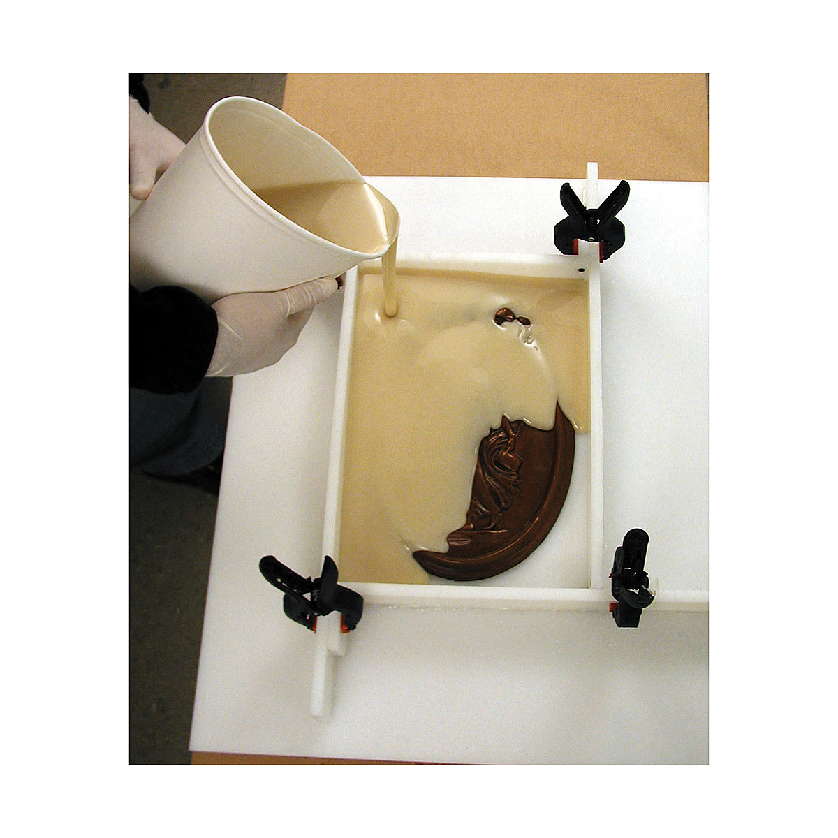 Smooth-On Oomoo 30 Silicone Rubber, pouring liquid into a mold