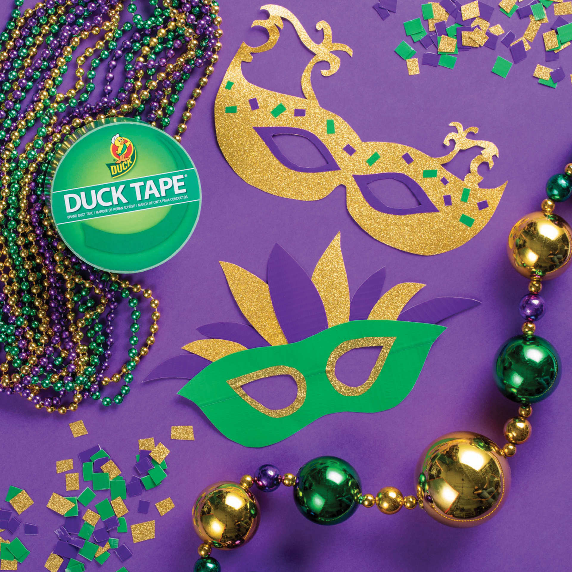 ShurTech Color Duck Tape - 1.88" x 20 yds, Green roll next to finished Mardi Gras mask examples