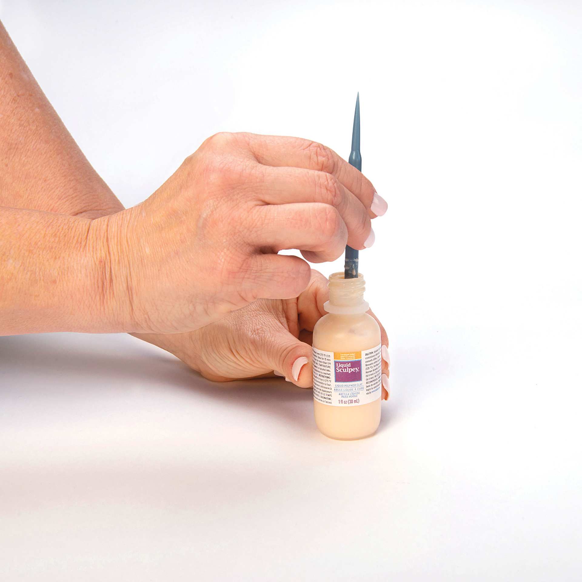 Sculpey Tools Silicone Mixing Set (Silicone being mixed)