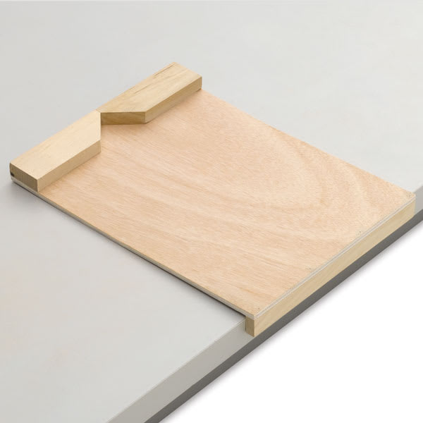 Martin Universal Design Carving Block Holder - Shown with lip fitted on edge of table
