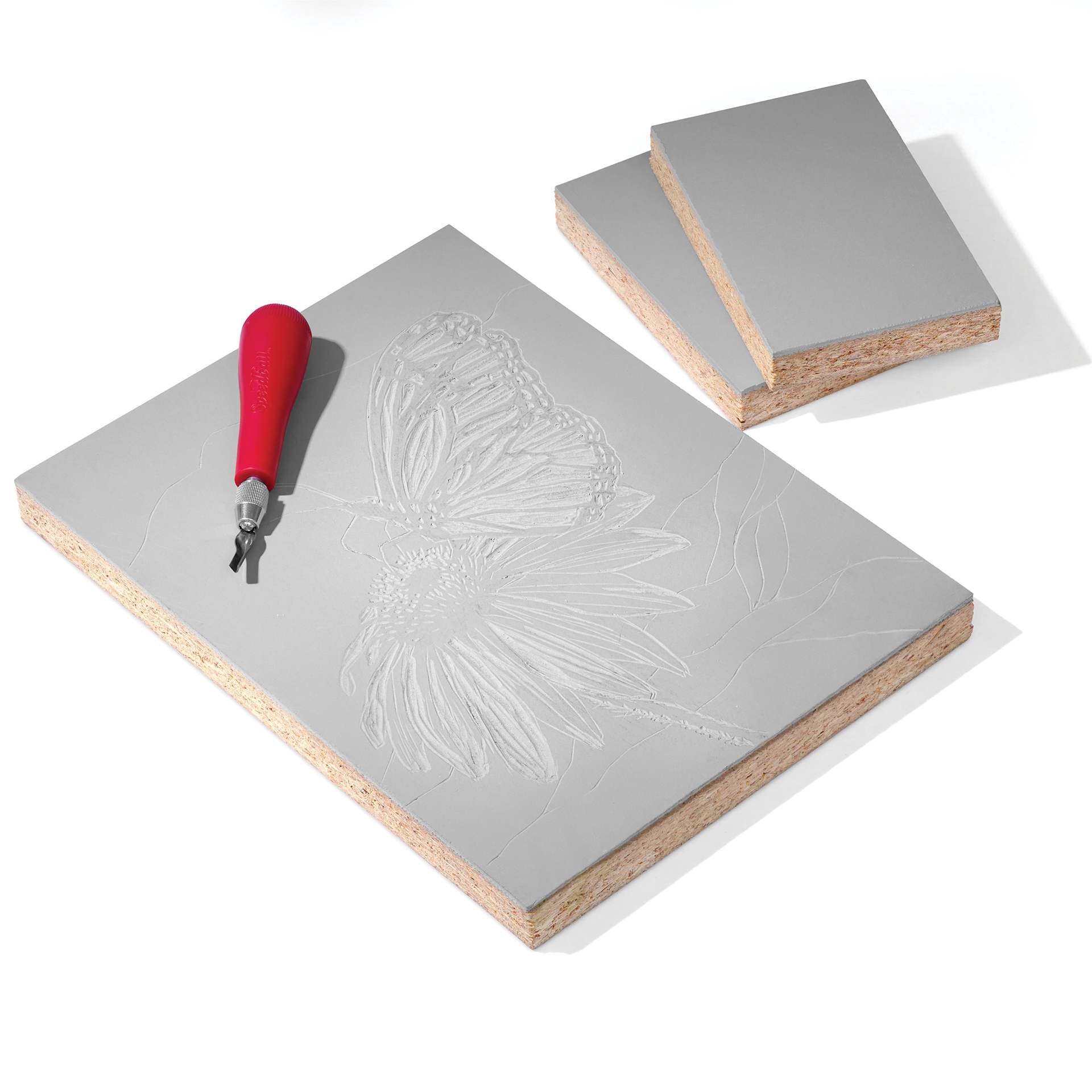 Blick Battleship Gray Mounted Linoleum Block - three blocks with linoleum cutter
