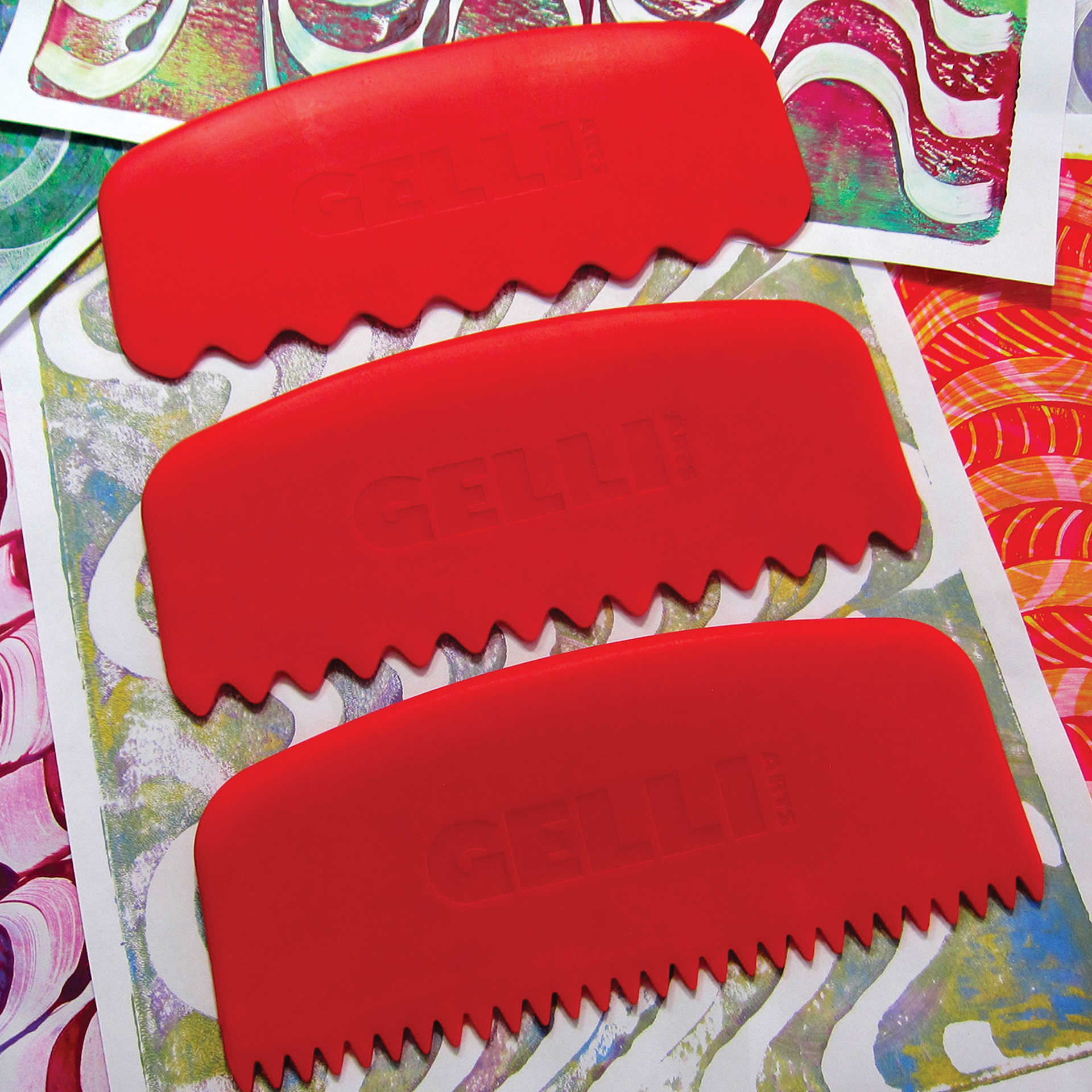 Gelli Arts Large Printing Tools - Set of 3, Round sitting with completed prints