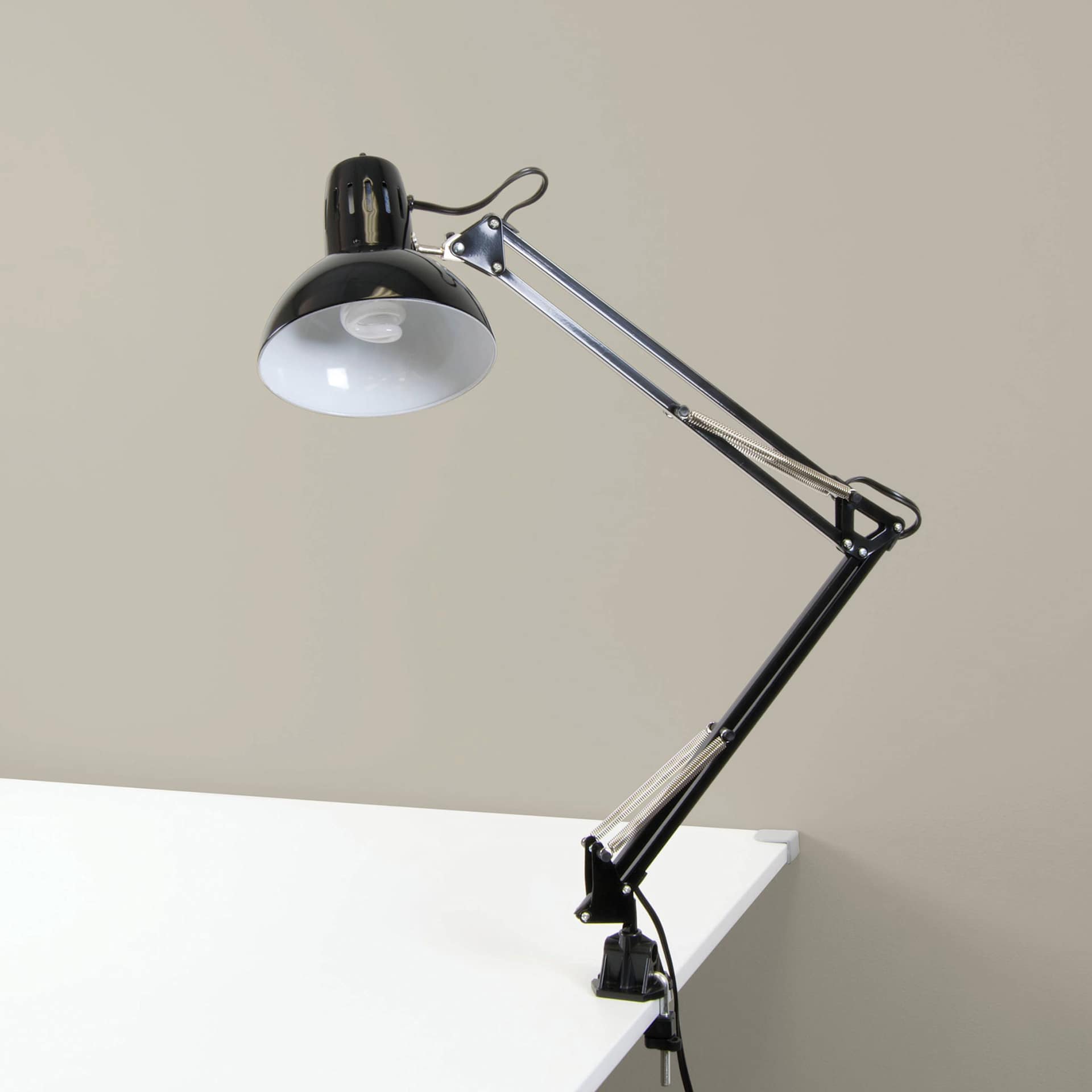 Studio Designs Swing Arm Lamp - Black, lamp clamped to table