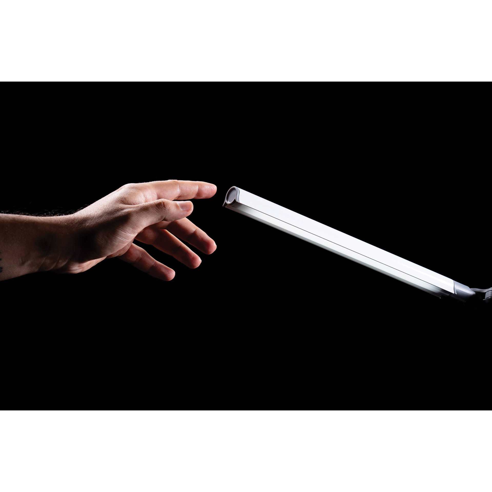 Daylight Duo Pro Table Lamp - finger reaching to touch bulb