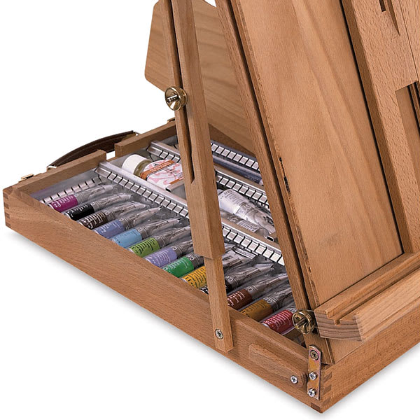 Sketchbox Table Easel - Angled view of Easel filled with paint tubes, not included Sketchbox Table Easel - Angled view of Easel filled with paint tubes, not included