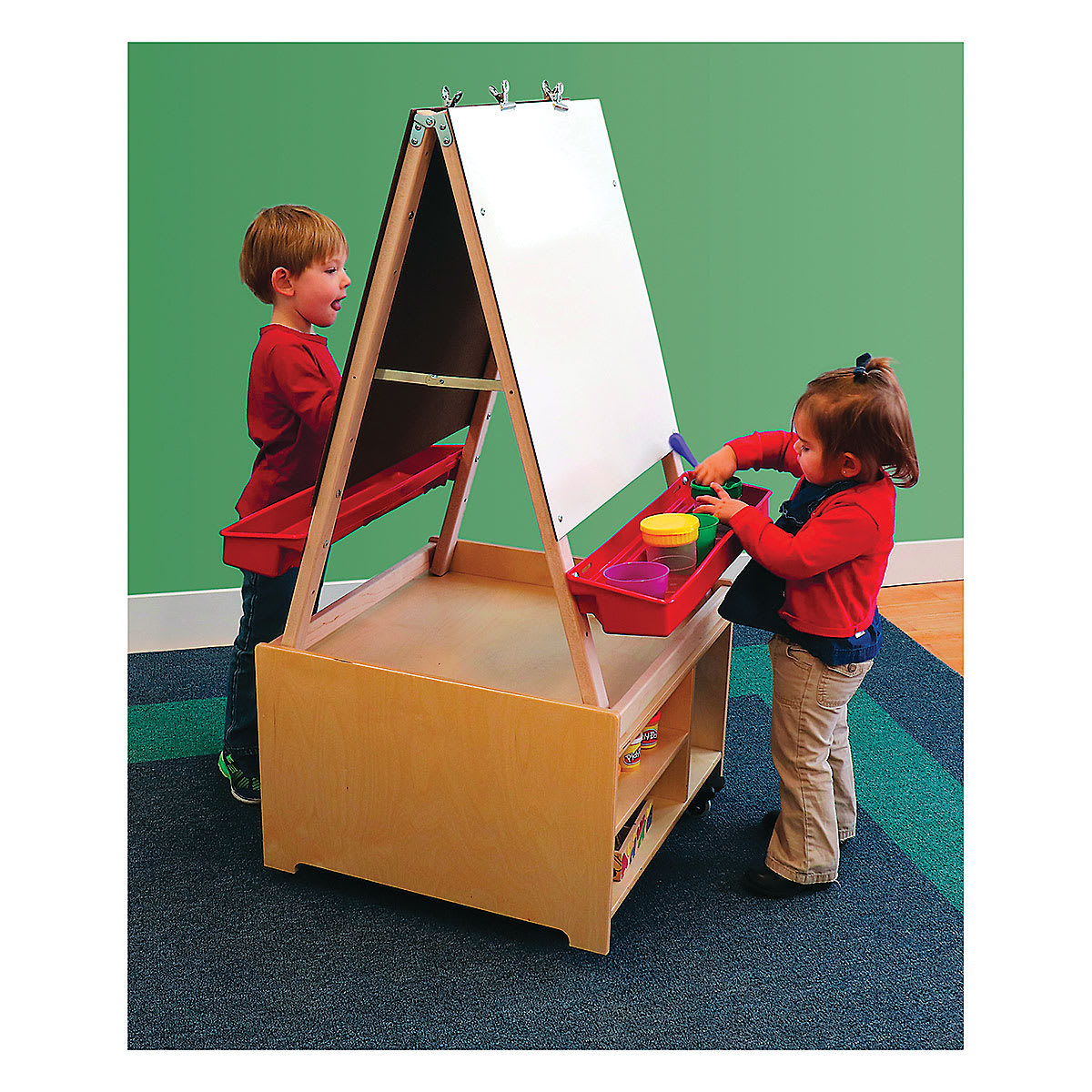Mobile Art Center-side view showing children painting on double sided easels