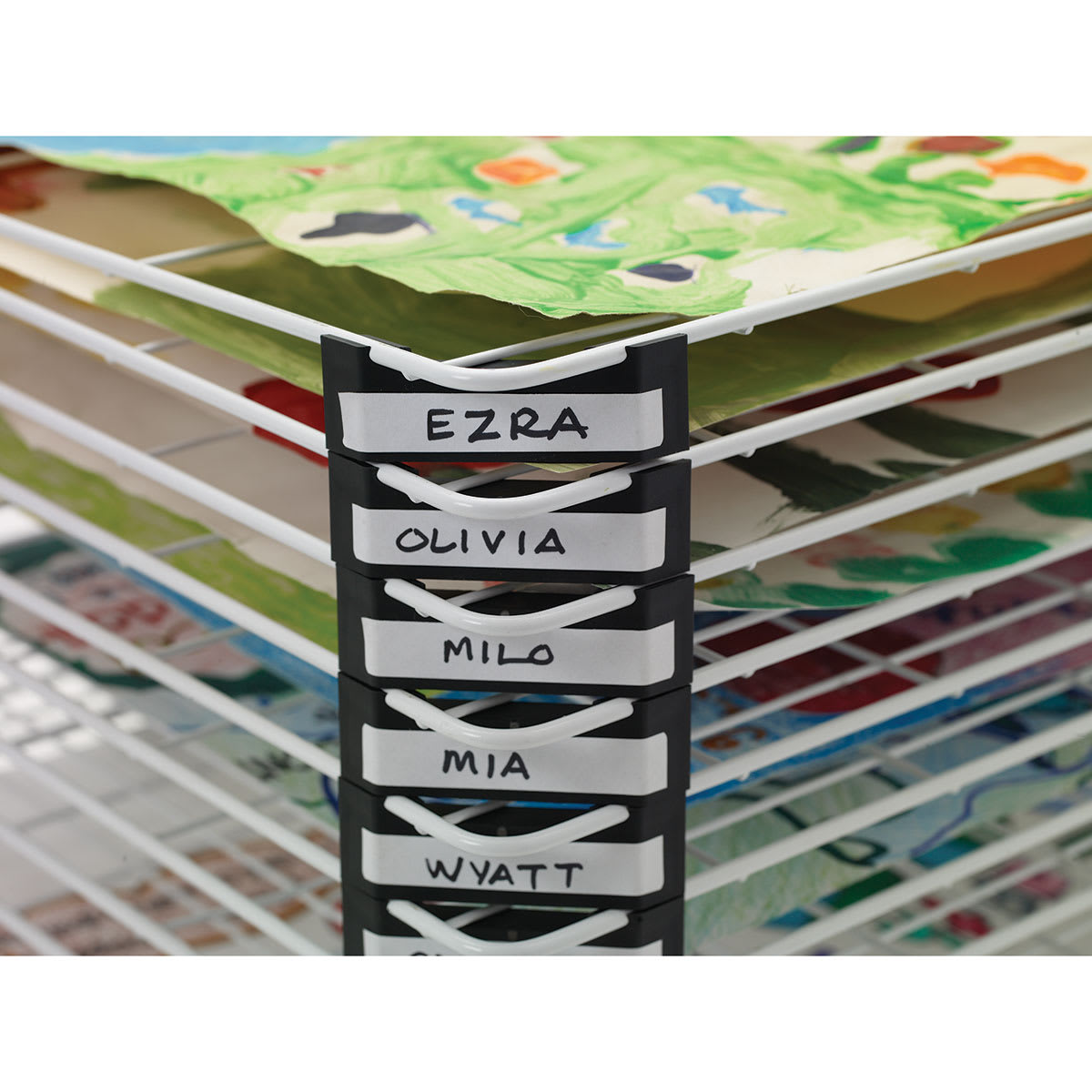 Side view of drying rack showing students' names on marked shelves