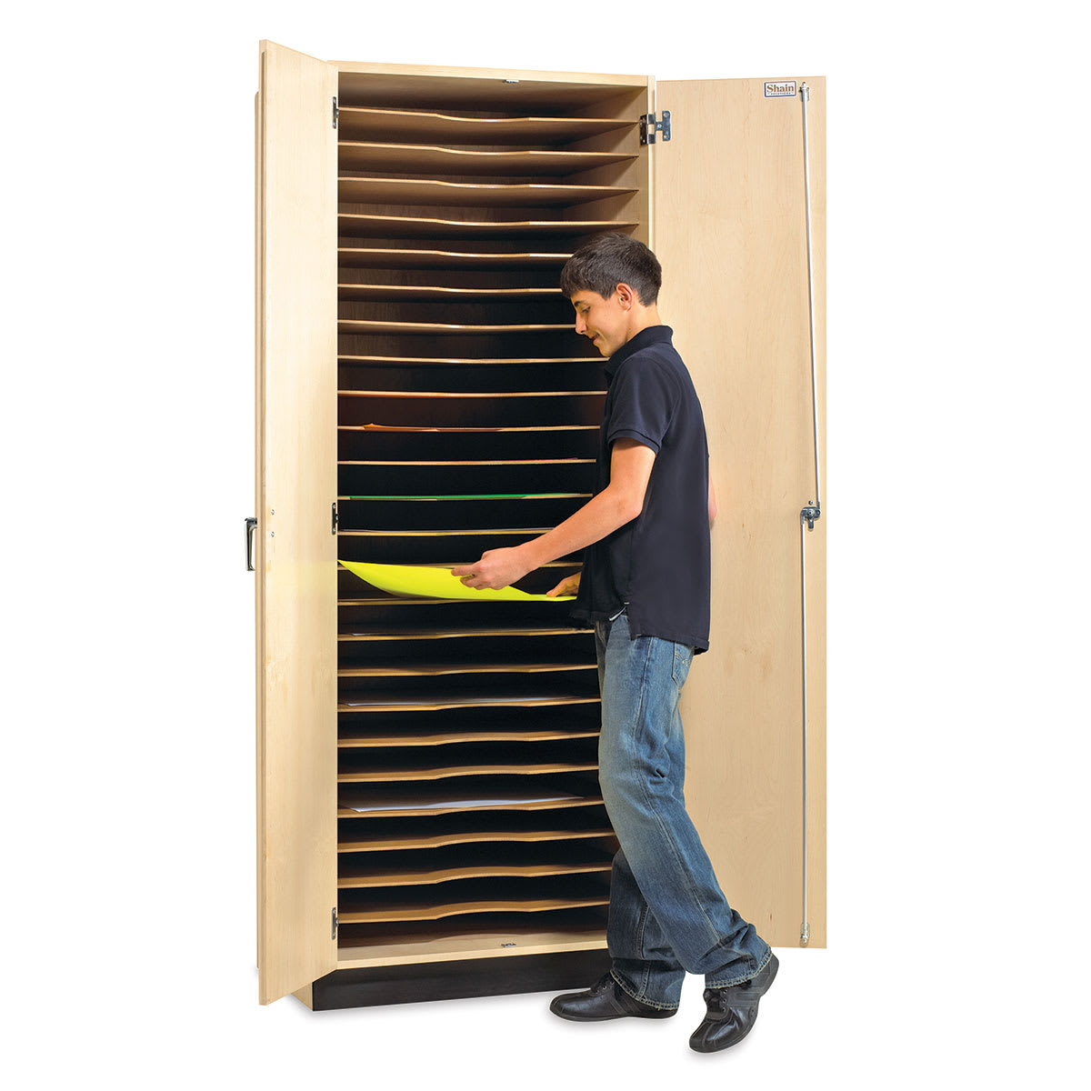 Paper/Drawing Board Storage Cabinet - Student at open cabinet removing Art Paper from slot