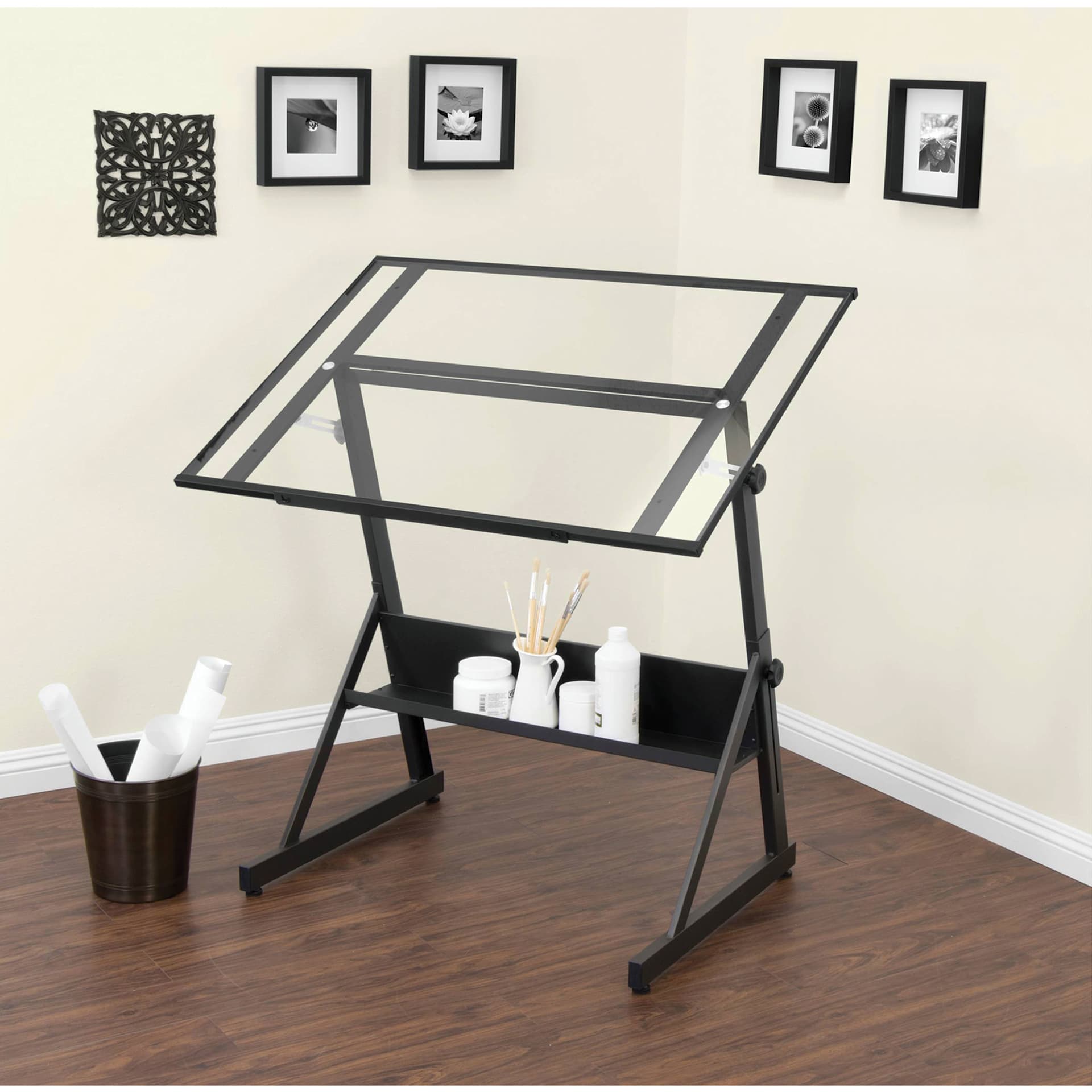 Studio Designs Solano Drafting Table - Charcoal Frame/Clear Glass, stationed inside a room
