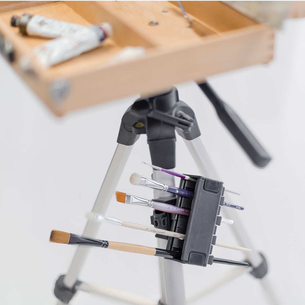 Brush Grip Rotating Brush Holder - mounted at angle on tripod leg Brush Grip Rotating Brush Holder - mounted at angle on tripod leg