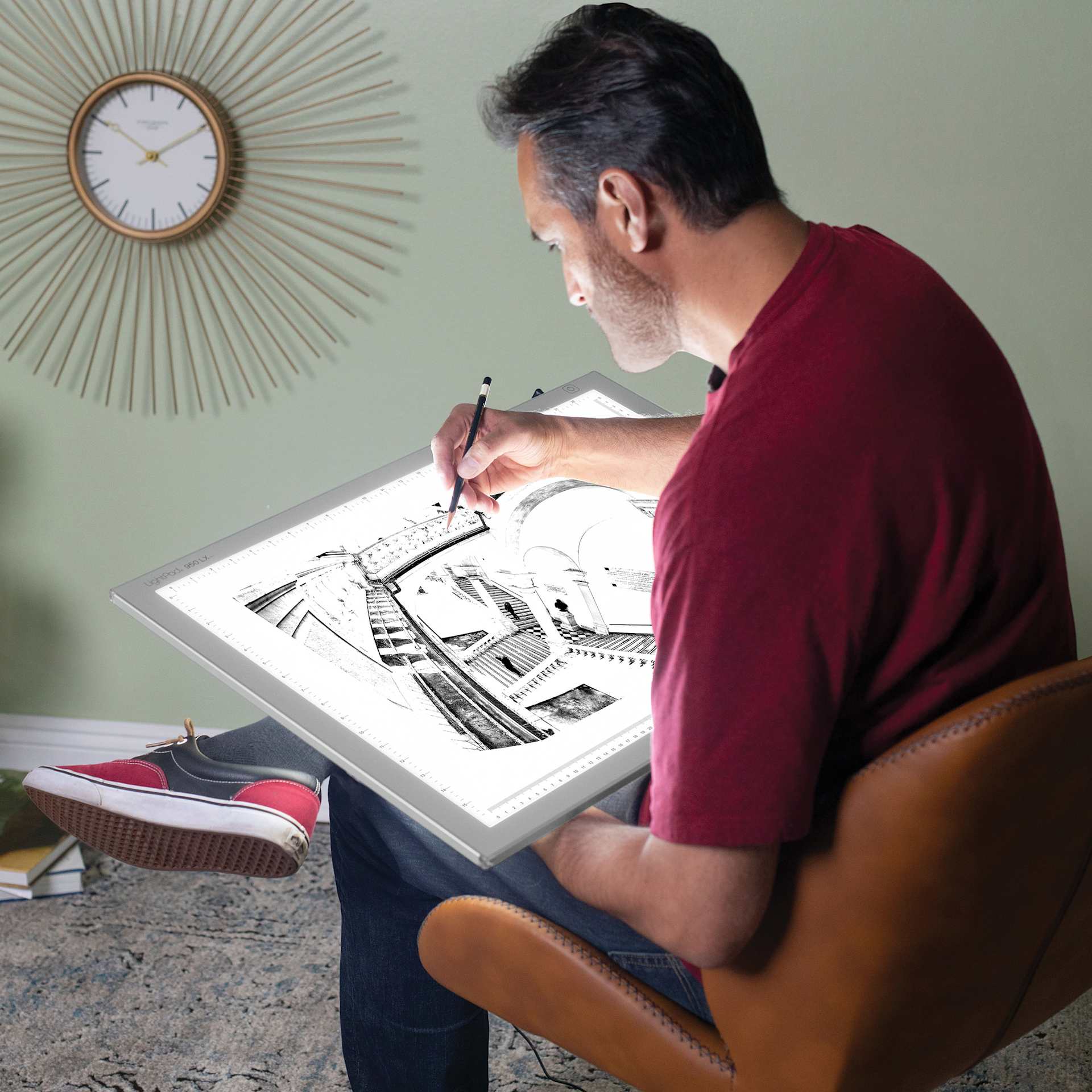 Person using the 17" x 24" Artograph LED LightPad. Person using the 17" x 24" Artograph LED LightPad.