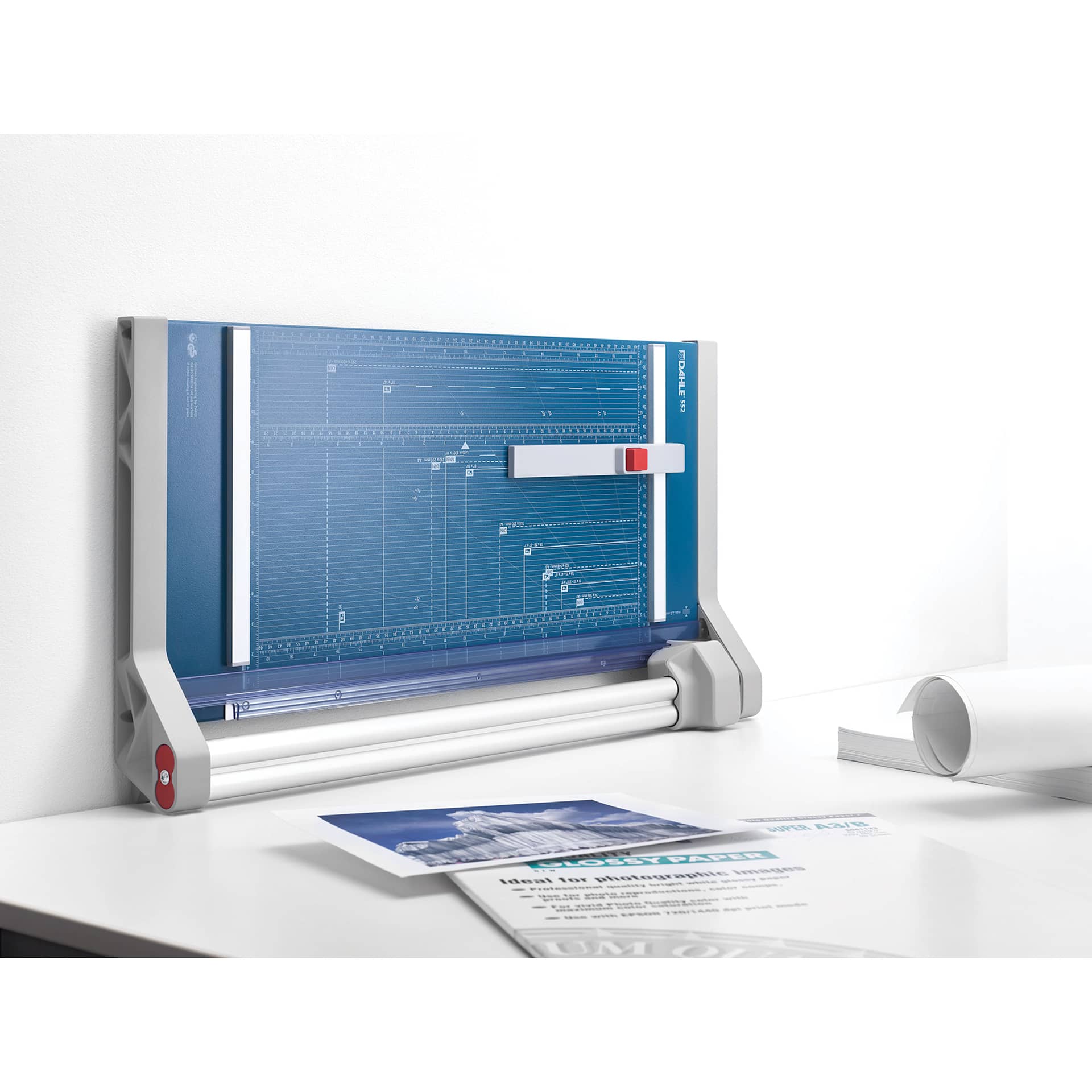 Dahle Professional Rotary Trimmer - 20" Cutting Length, upright on table against wall Dahle Professional Rotary Trimmer - 20" Cutting Length, upright on table against wall
