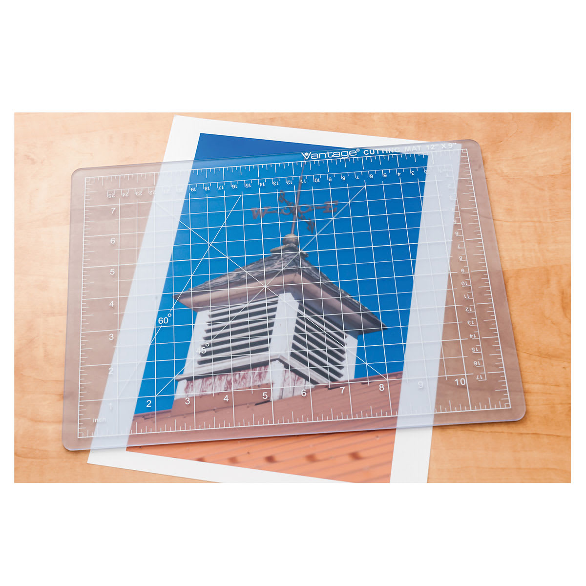 Dahle Self-Healing Cutting Mats - Clear mat placed above photo to show transparency