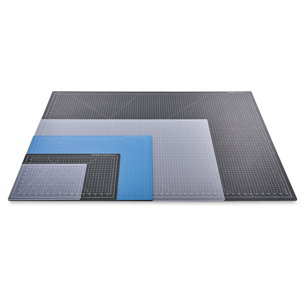 Dahle Self-Healing Cutting Mats - Angled view of Assortment of Colors and Sizes of Mats