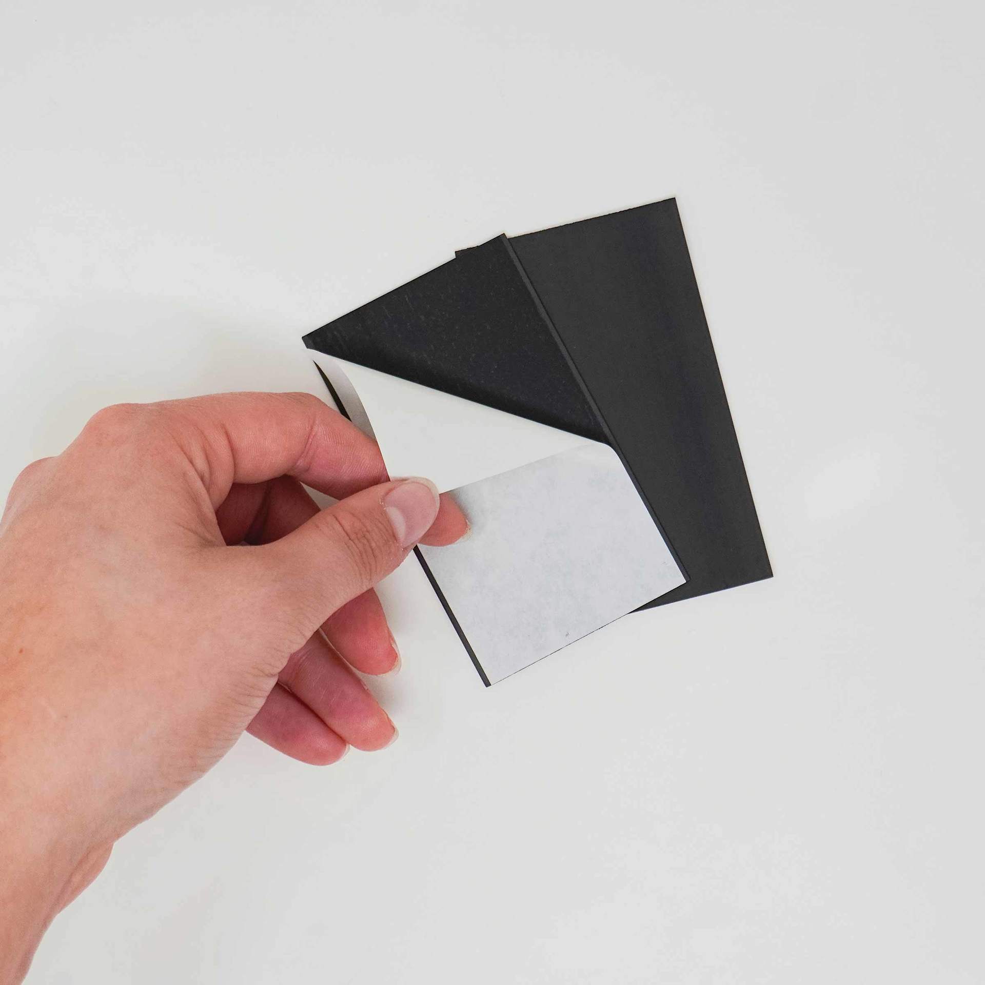 ProMag Magnetic Business Cards - 2" x 3.5", Pkg of 10 Cards, adhesive cover being peeled
