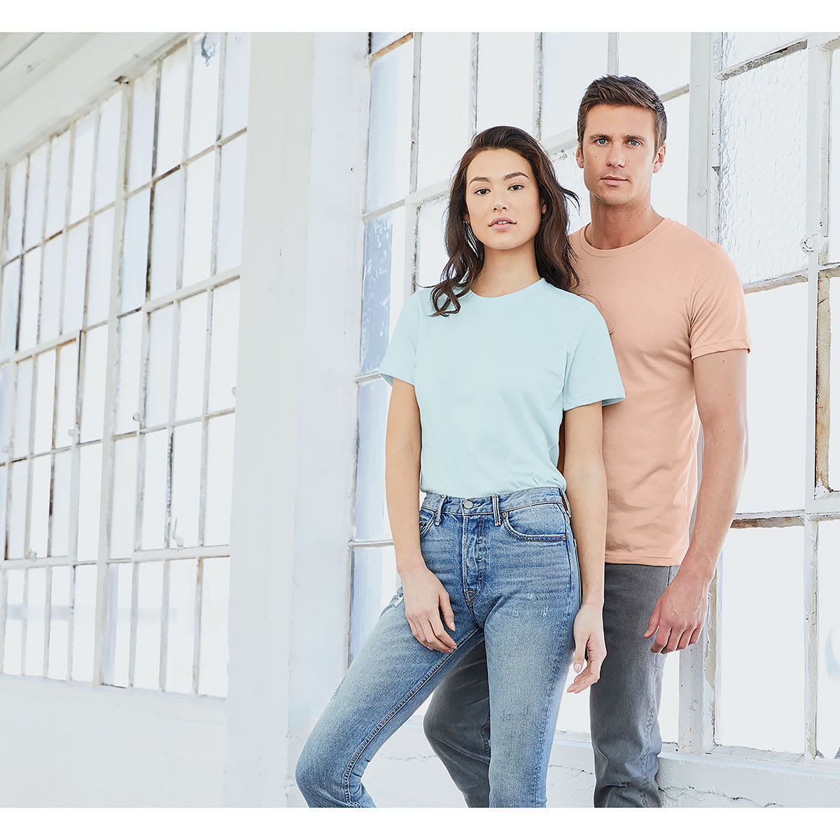 Bella Canvas Unisex T-shirt - Peach Heather, Small - couple wearing shirts of different colors