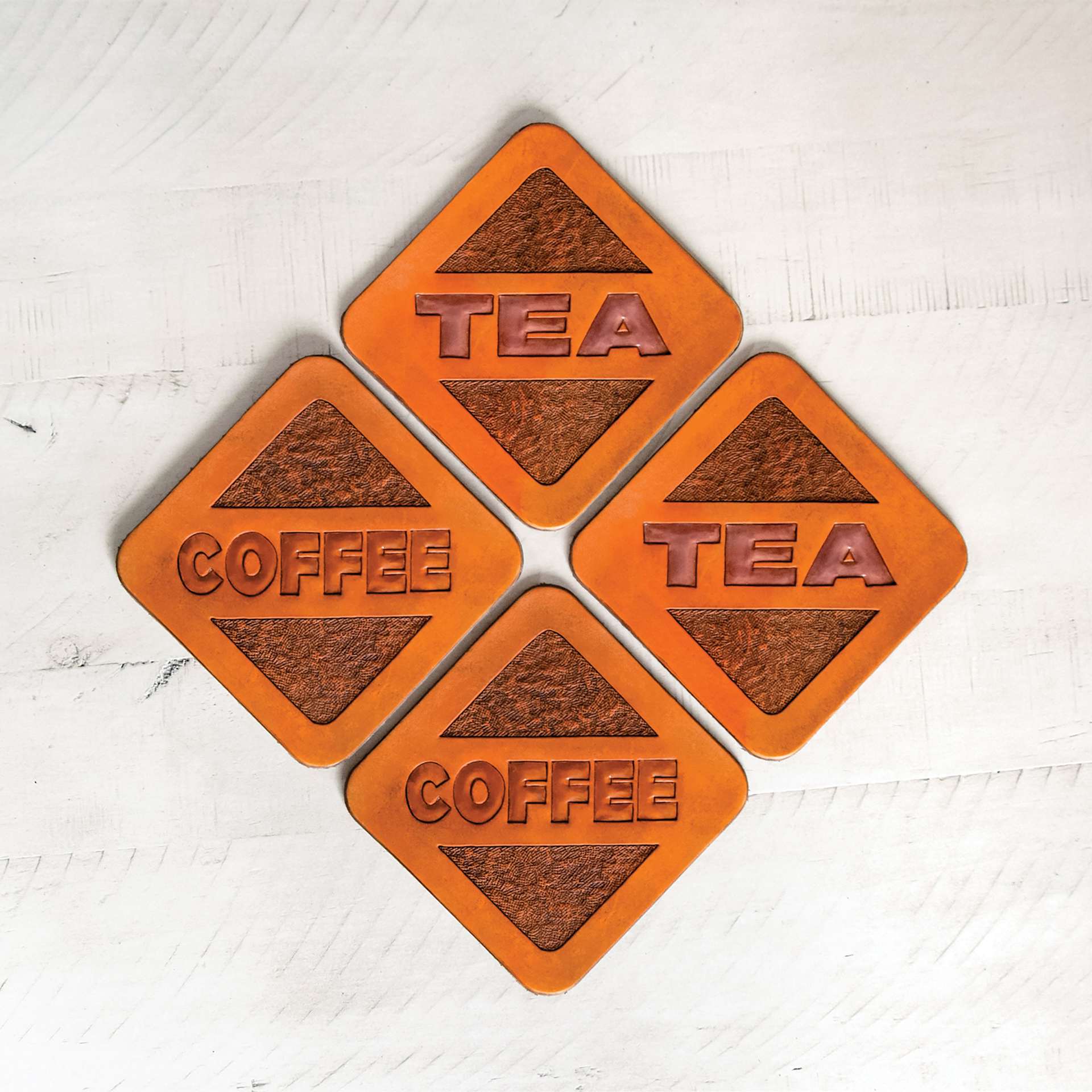 Realeather Leather Coasters - Square, 4" x 4", Set of 4, customized coasters arranged in a diamond side-by-side