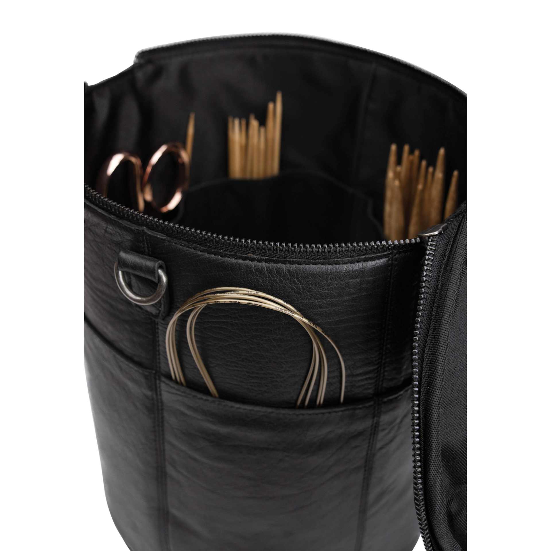 Muud Saturn XL Leather Needlework Project Bag - Black - close-up, holding materials (not included)