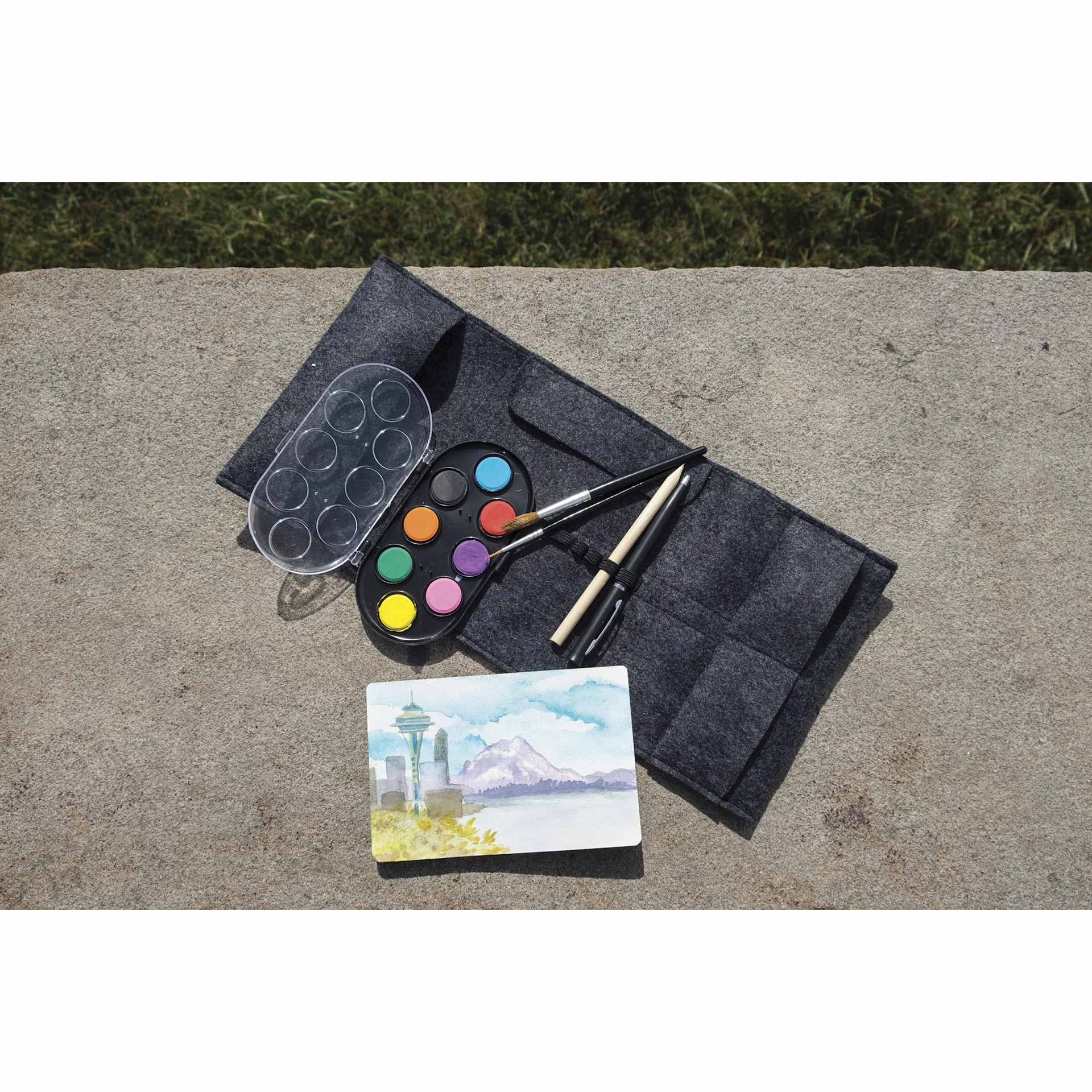 Three By Three Jotblock Travel Postcard Watercolor Paint Set, on bench