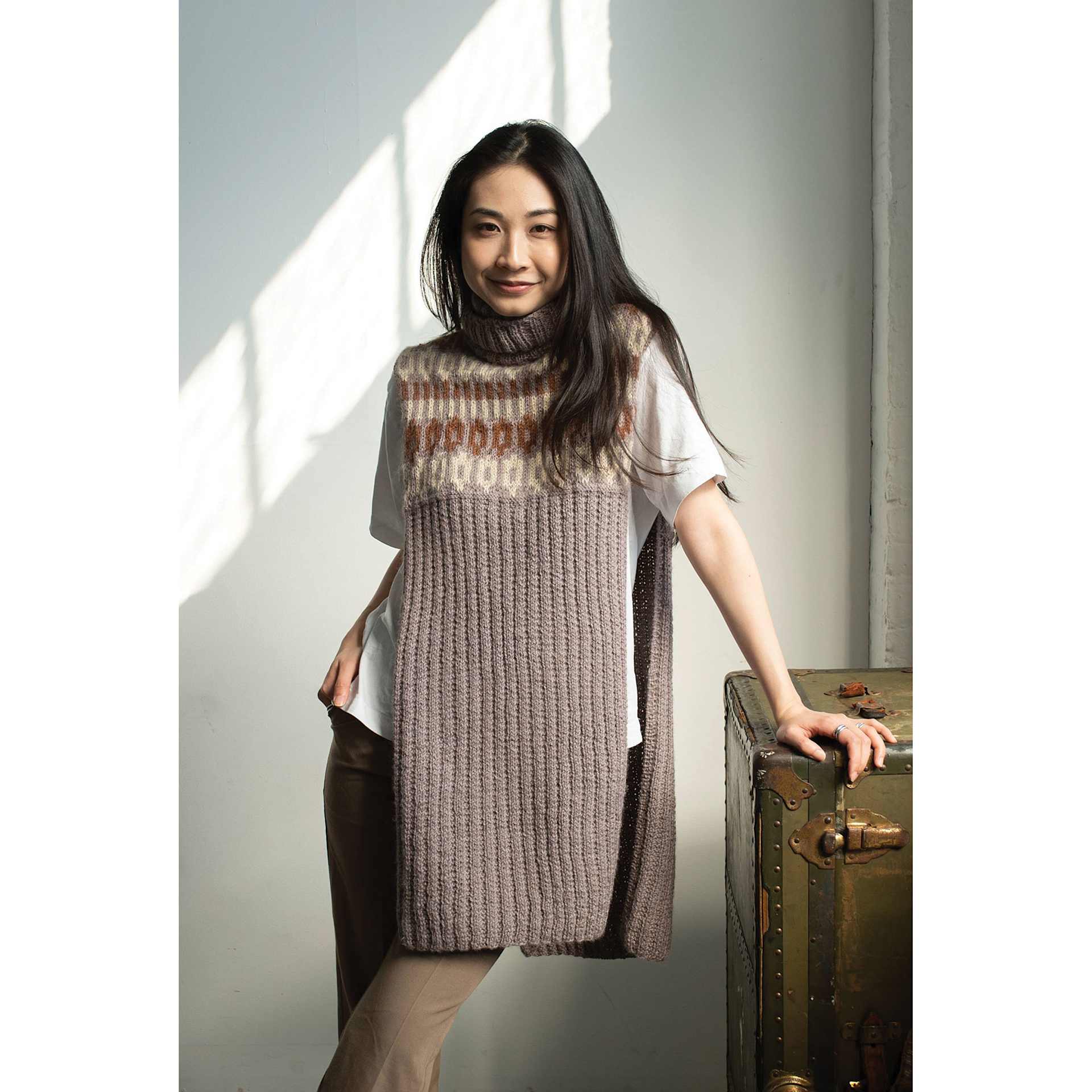 Lion Brand Re-Spun Yarn, adult wearing long shirt made out of yarn