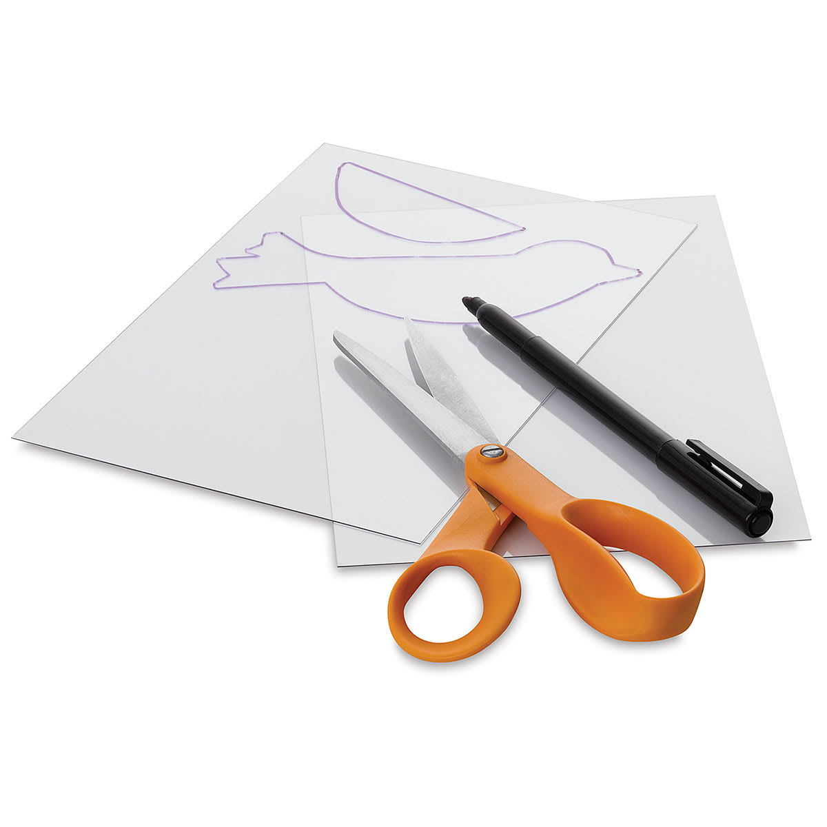 Grafix Craft Plastic - Outline of bird on plastic with scissors and pen
