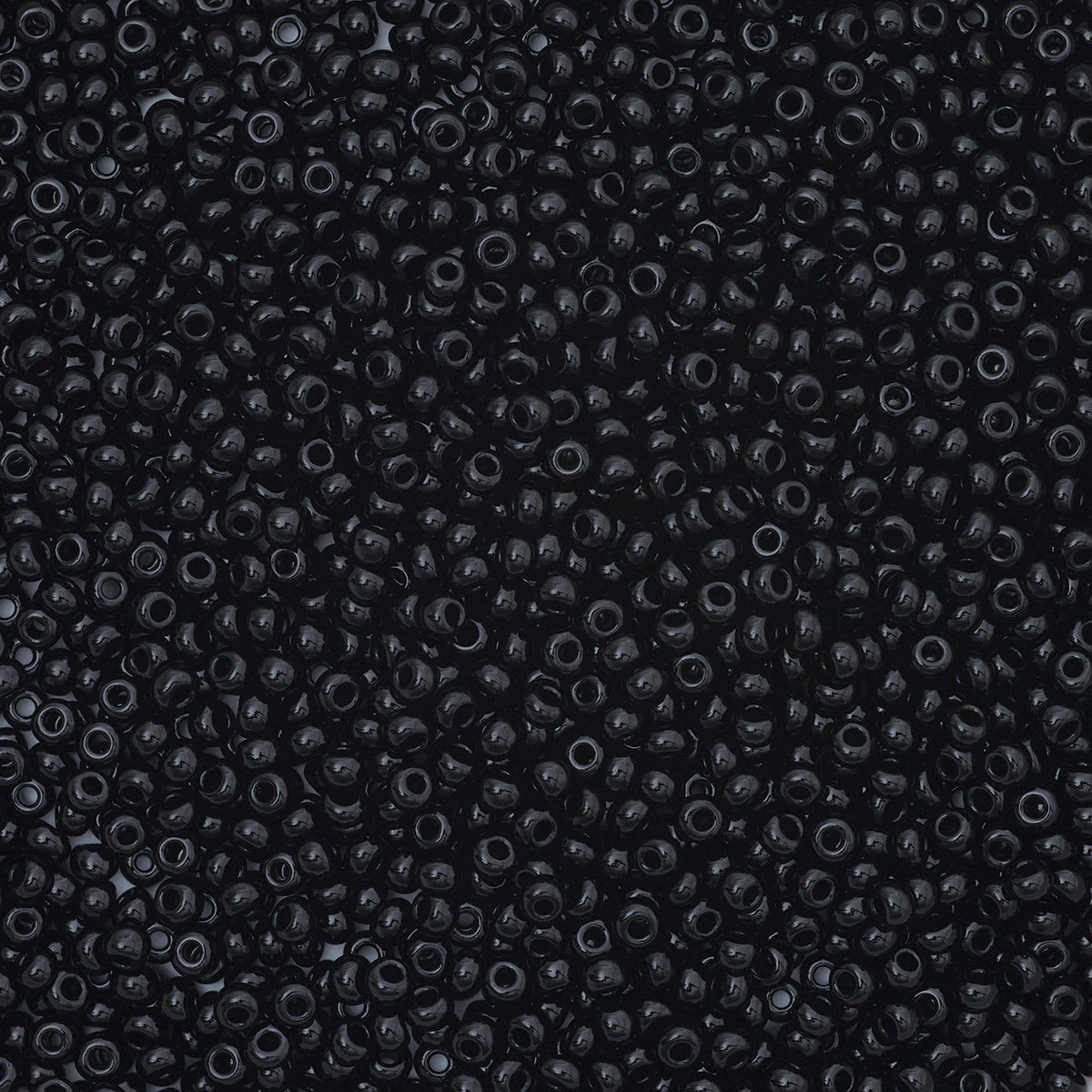 John Bead Czech Glass Seed Beads - Black, 10/0, 22 g Vial close up