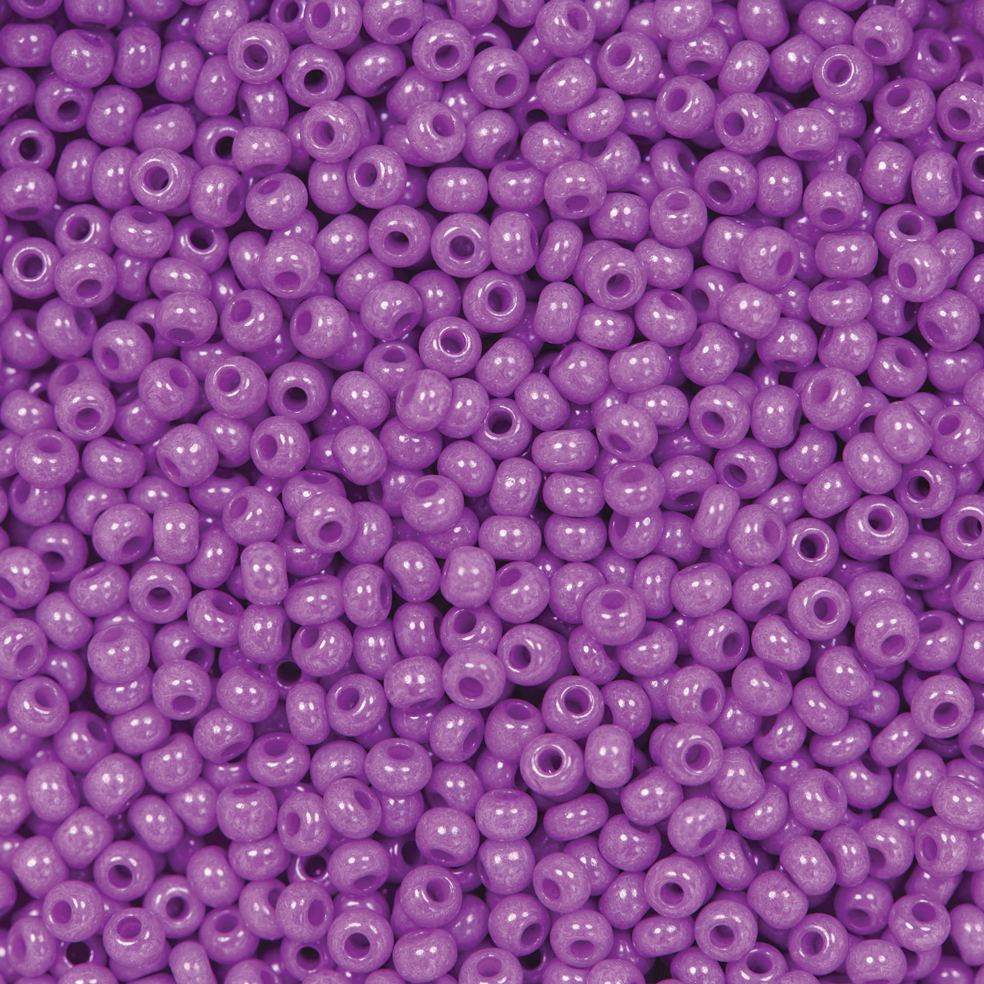 John Bead Czech Glass Seed Beads - Dyed Lilac, Opaque, 10/0, 22 g Vial close up