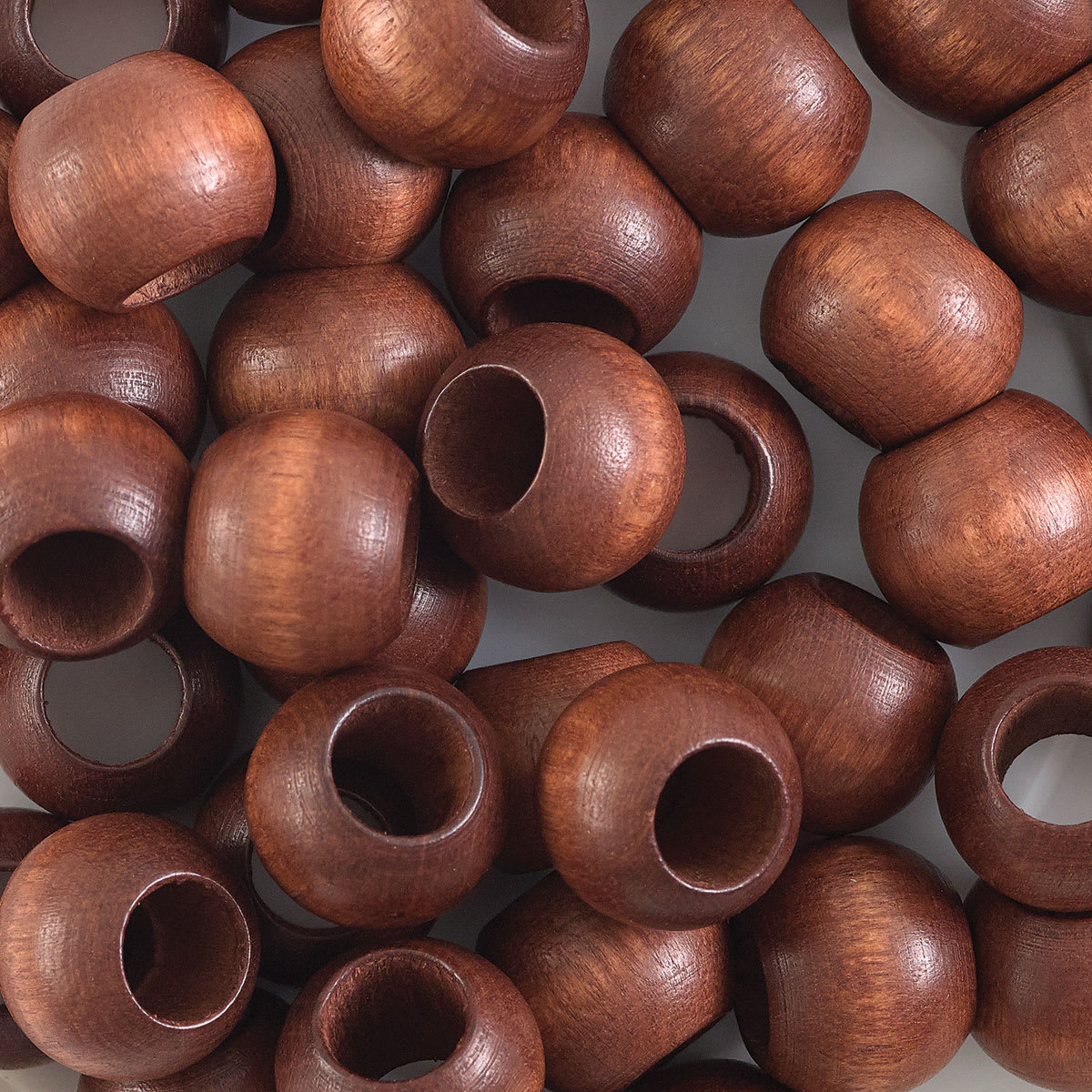 John Bead Euro Wood Beads - Dark Brown, Round Large Hole, 12 mm x 9.8 mm, Pkg of 40 - close-up of beads