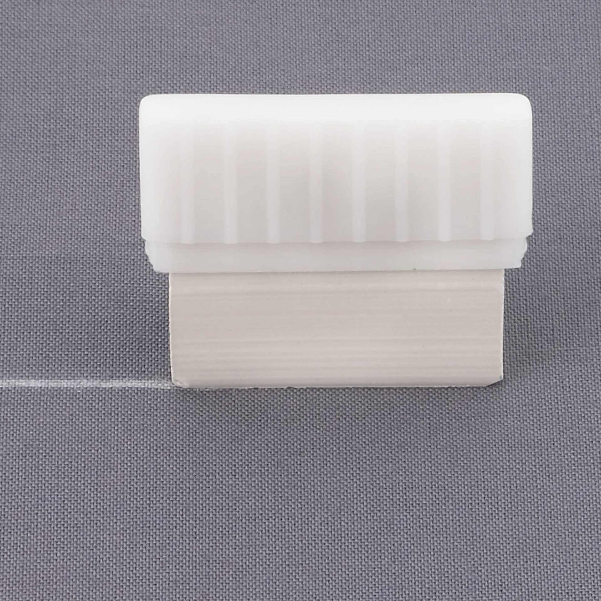 Dritz Tailor's Chalk & Holder Set in use on fabric
