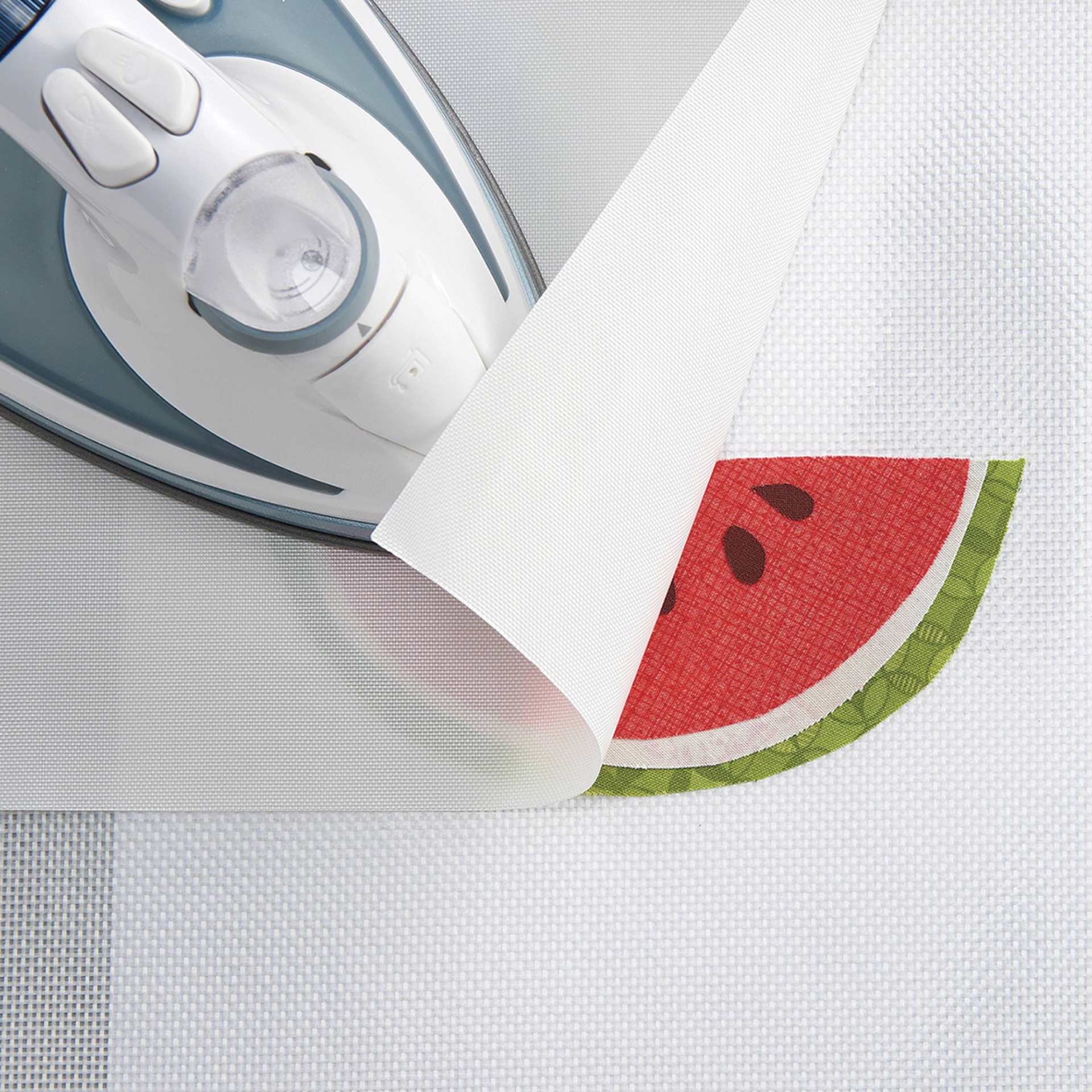 Clover Design Pro Appliqué Mat, ironing watermelon design onto fabric 