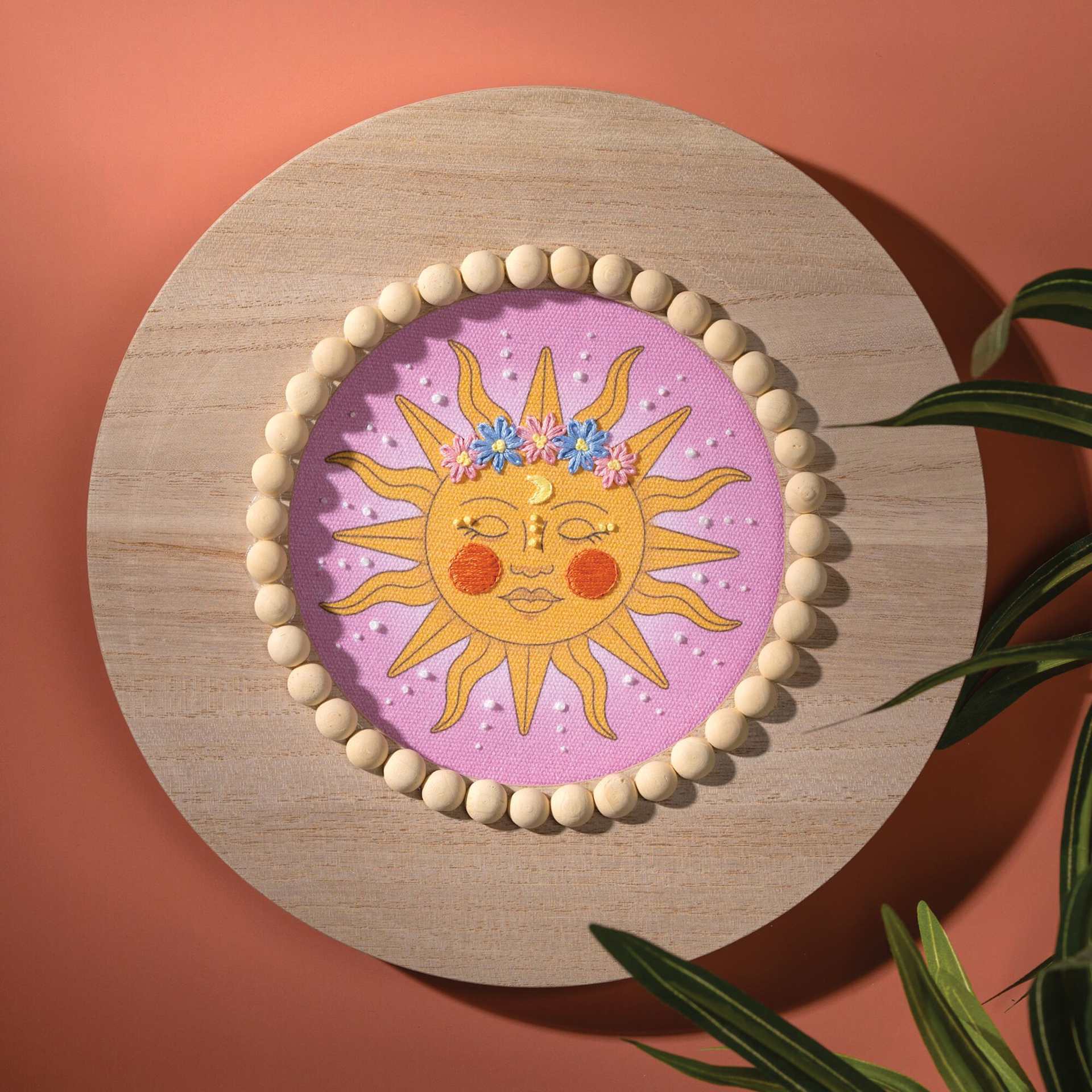 Bucilla Mindful Stitching Stamped Embroidery Kit - Dreamy Sun, 6" completed project mounted to wood