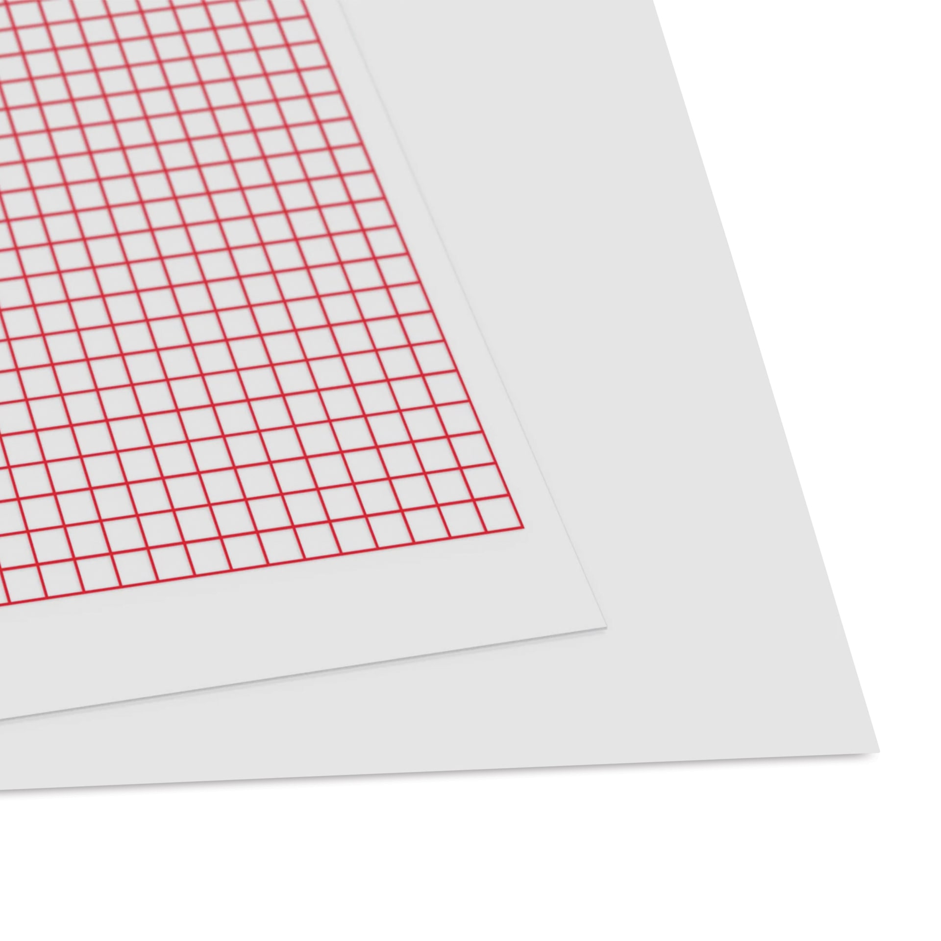 Dritz Quilting Template Sheets - 8.5 in x 11 in - close-up of corner of one grid template sheet and one blank