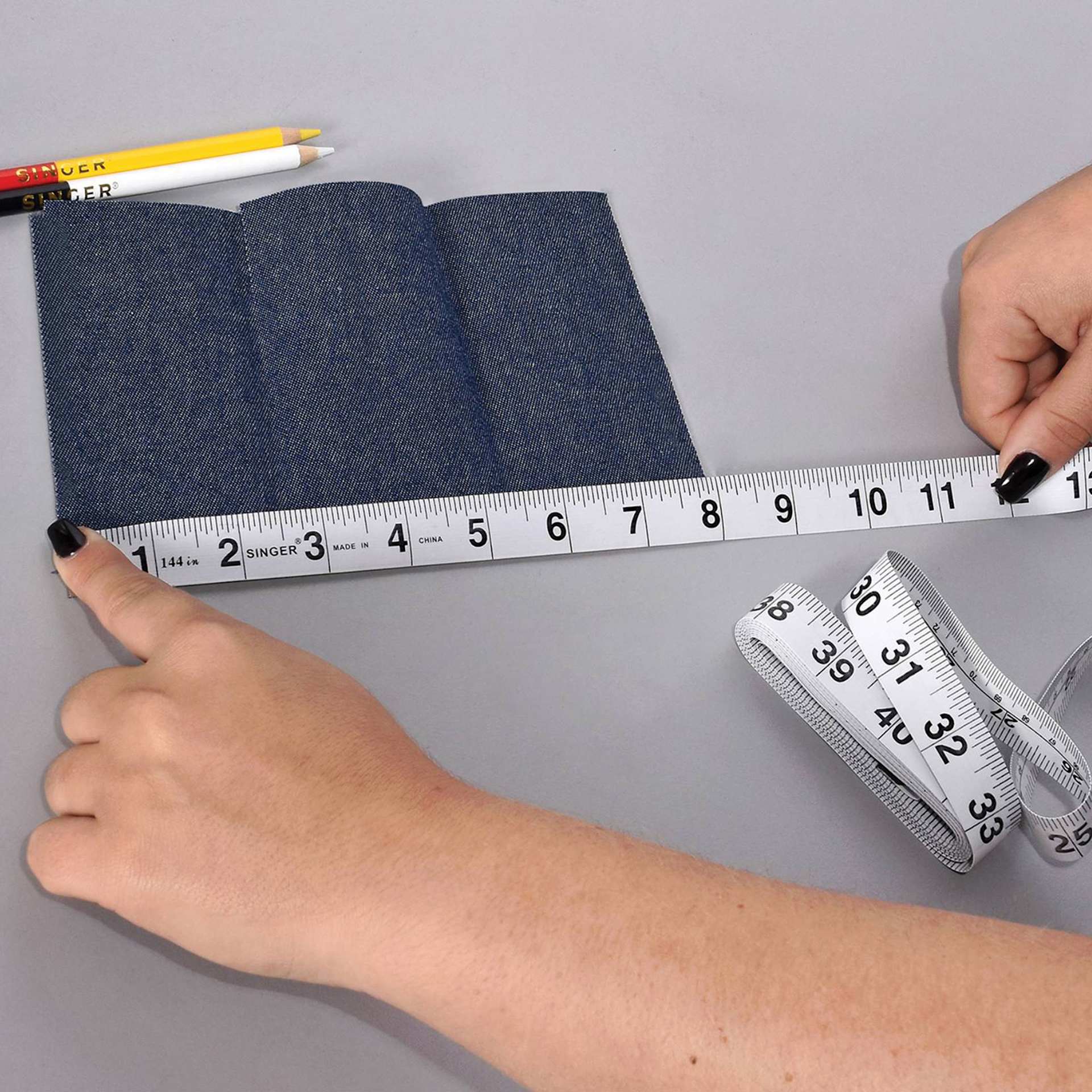 Singer Measure and Mark Pro Set measuring tape in use