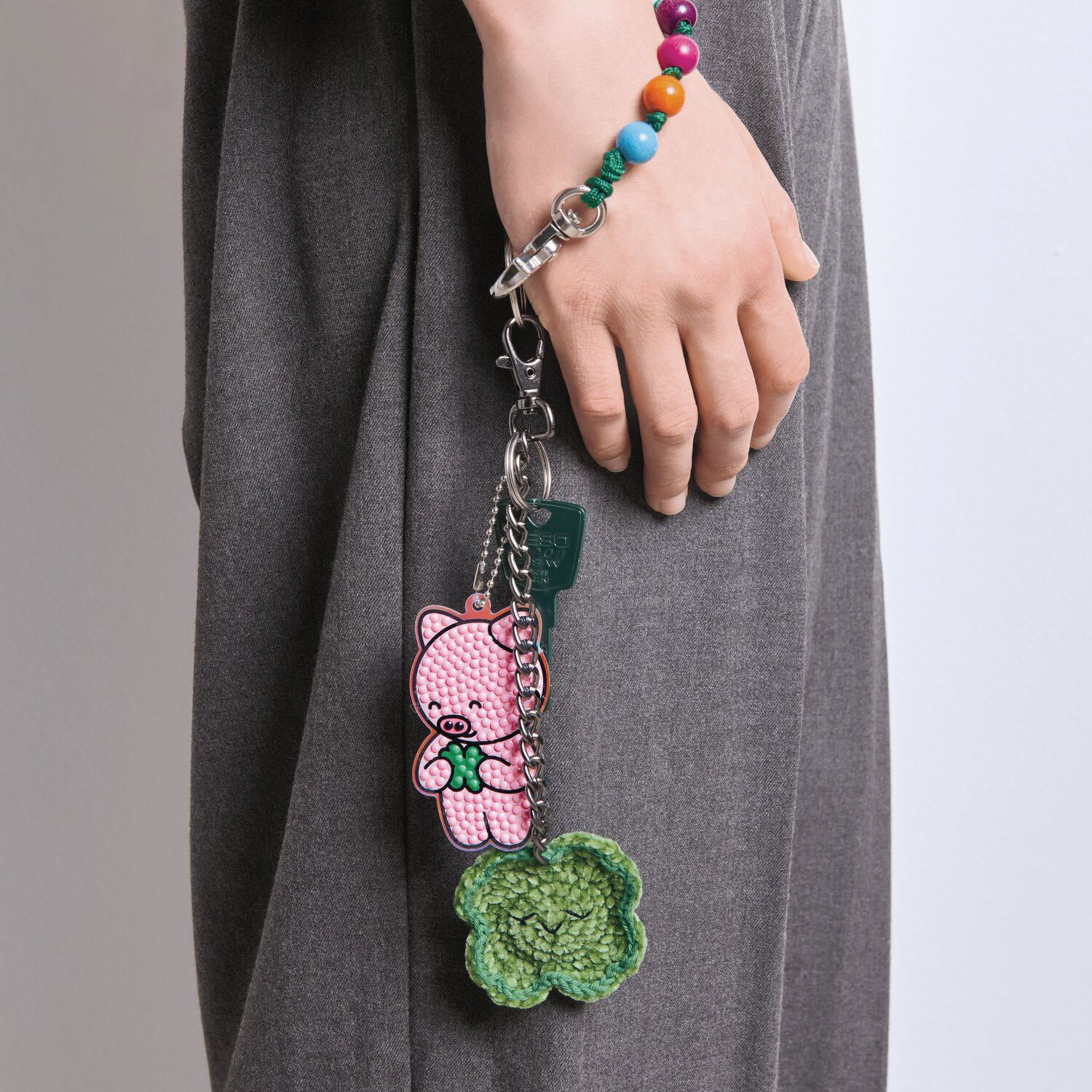 Rico Design Ricorumi Crochet Keyring Kit - Earth completed clover project attached to keychain