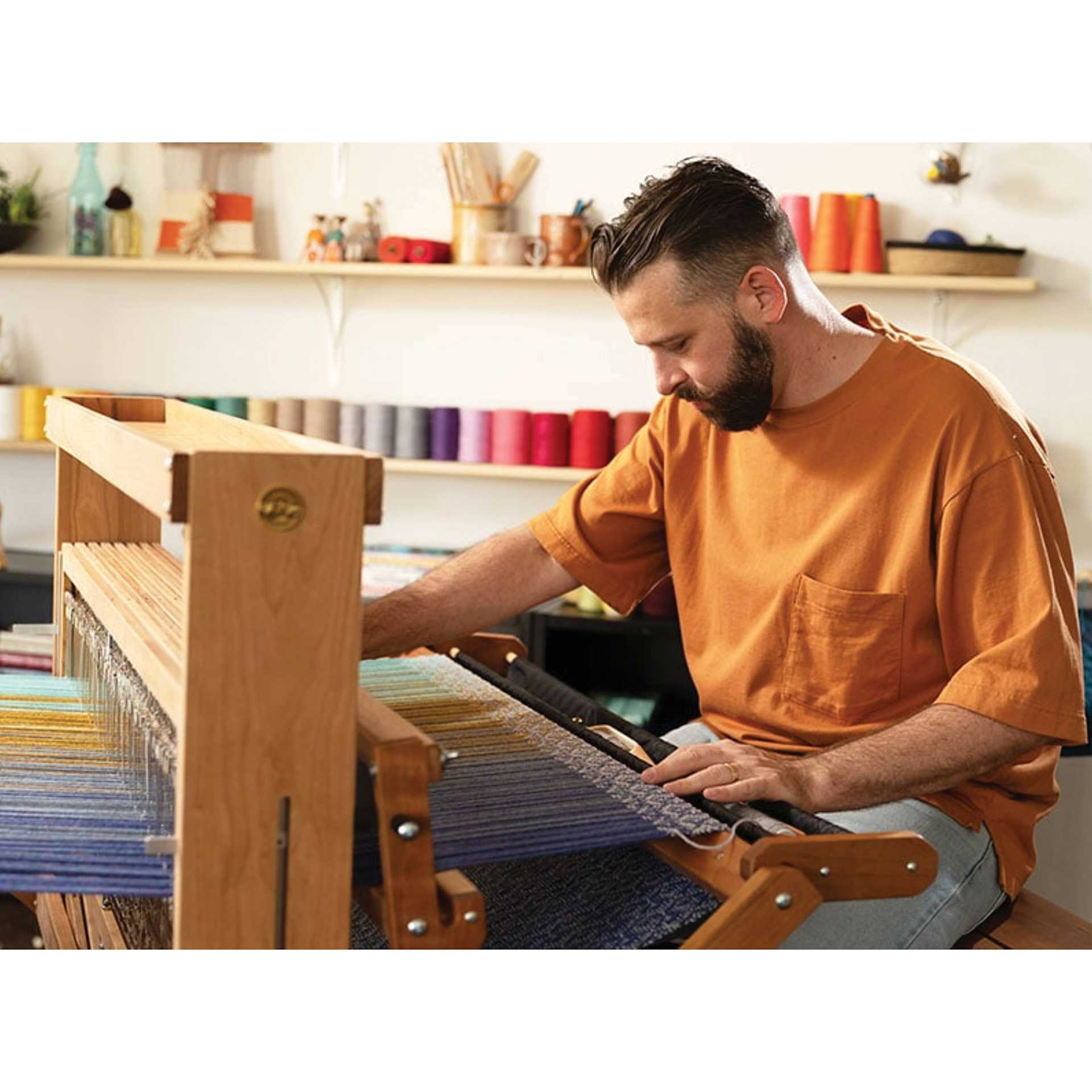 Schacht Wolf Loom Trap, adult using trap to store tools (loom and tools not included)