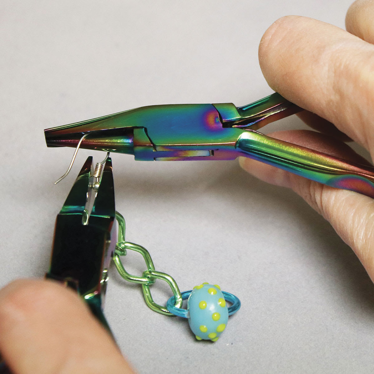 Beadsmith Chroma Half Round Nose Half Concave Pliers, Shown in use.