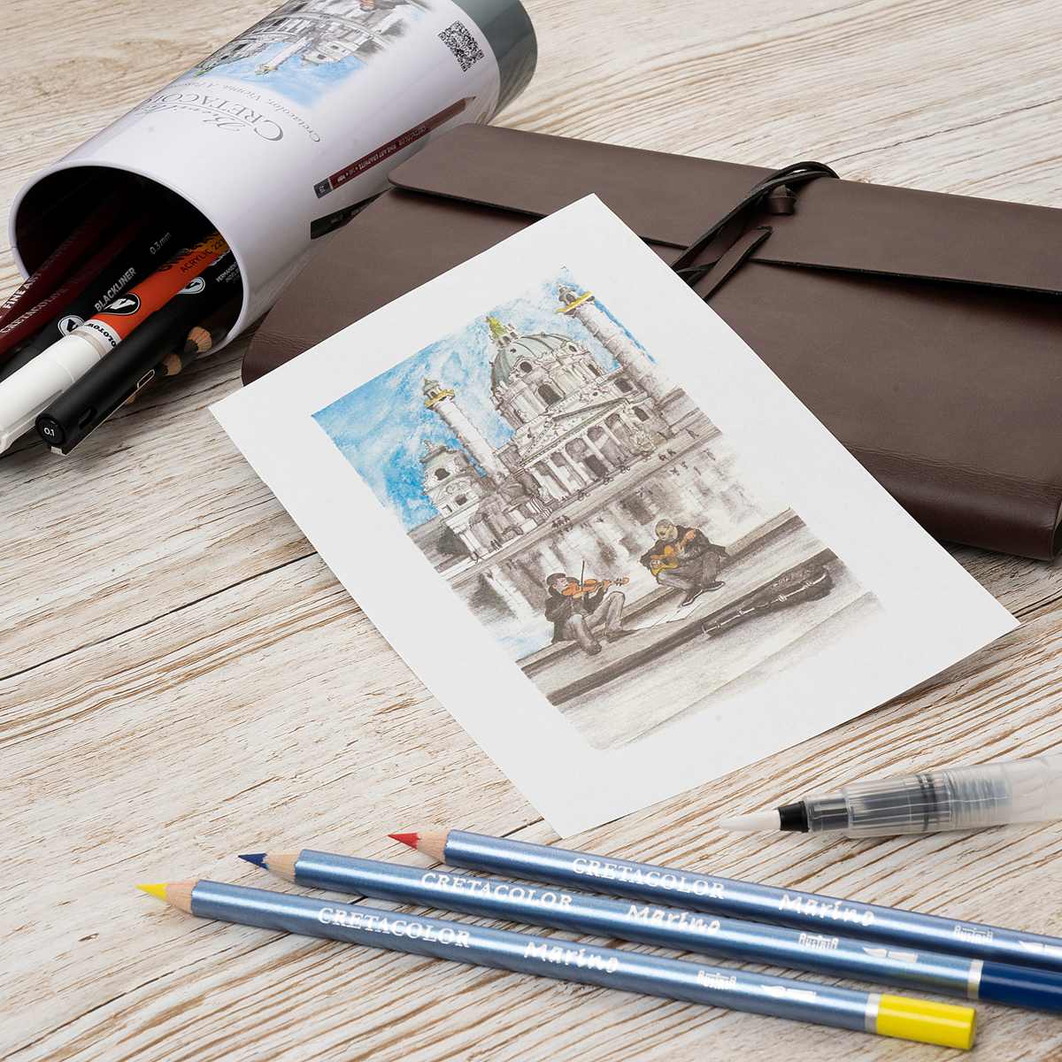 Cretacolor Urban Sketching Set, 24 Pieces, some contents on desk with drawing
