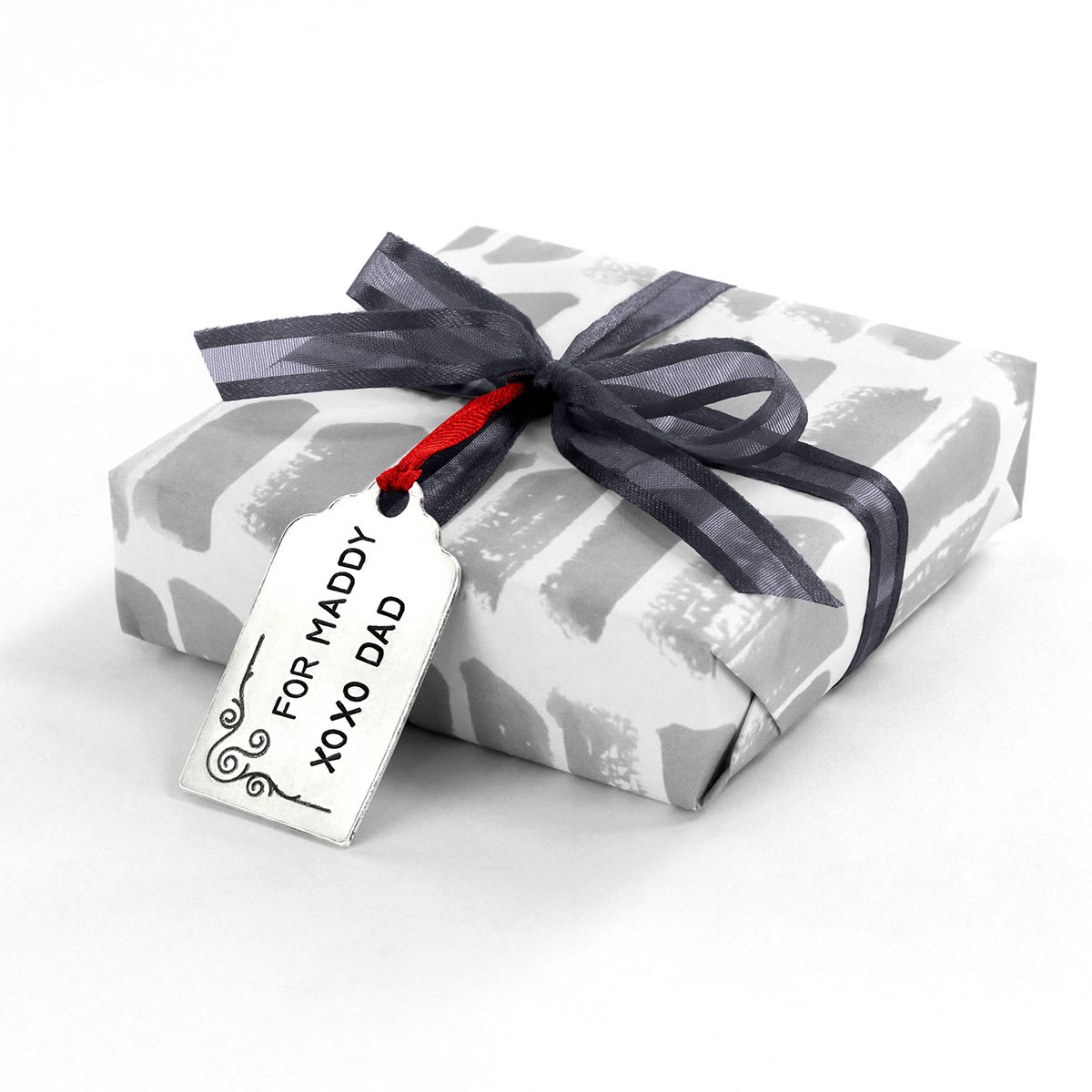 ImpressArt Stamp It Yourself Tag Kit, stamped gift tag on wrapped present