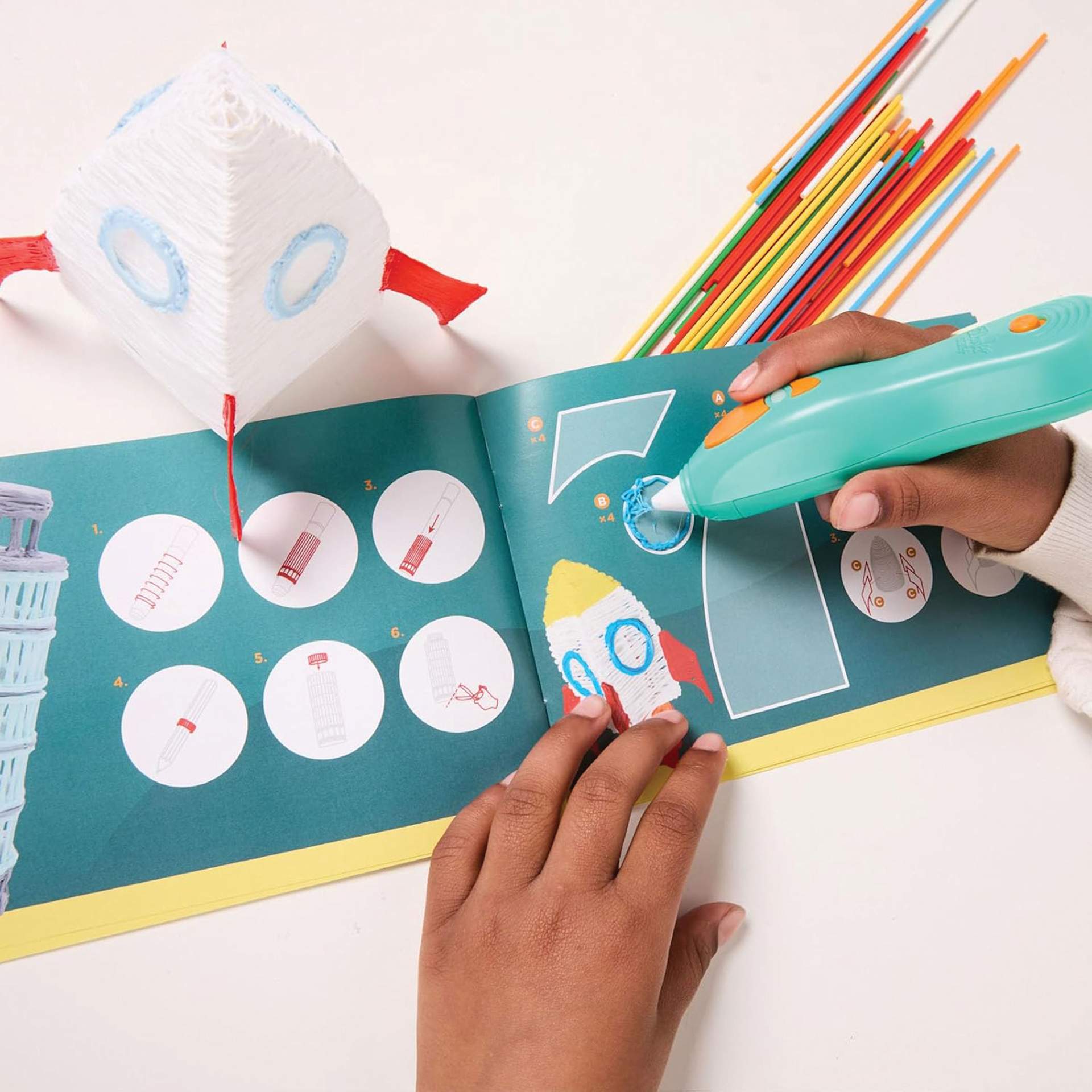 3Doodler Start+ Essential Pen Set applying filament to Doodlepad