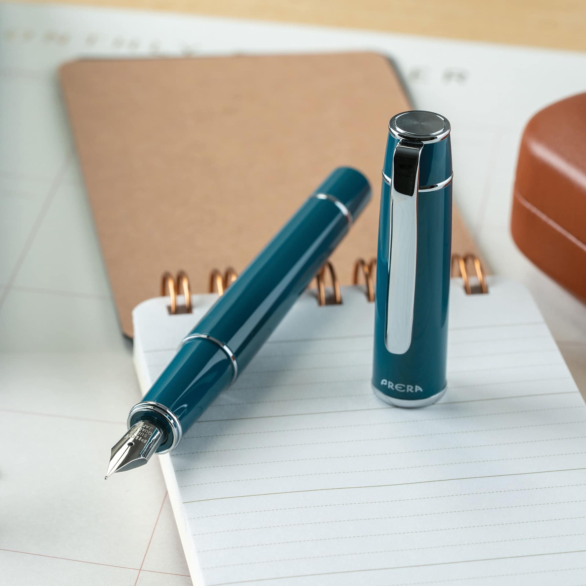 Pilot Prera Standard Fountain Pen - Empresss Teal, Medium, cap off with notepad (not included)