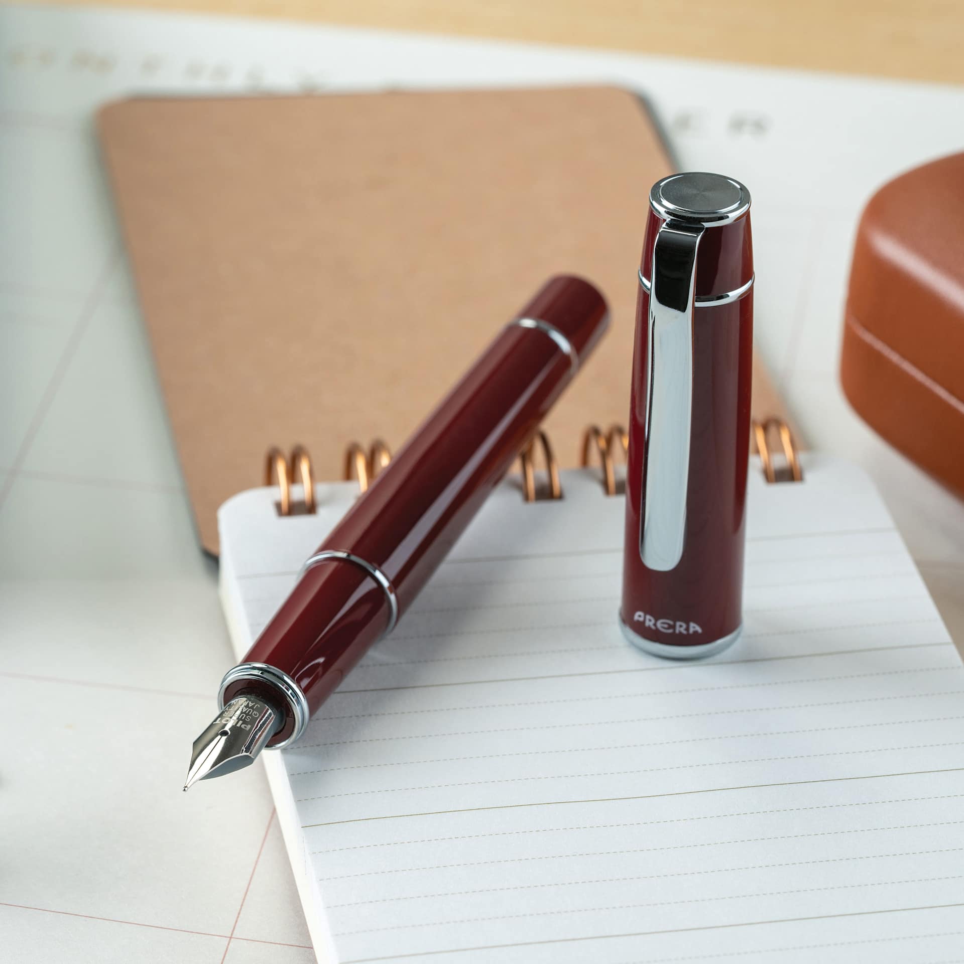 Pilot Prera Standard Fountain Pen - Cinnamon Brown, Fine, on notepad (not included)