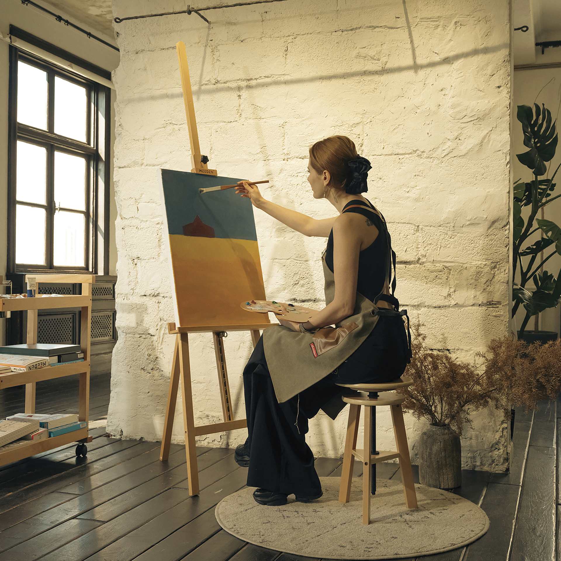 Meeden Large A-Frame Easel - Natural Beech Wood, in use with canvas mounted