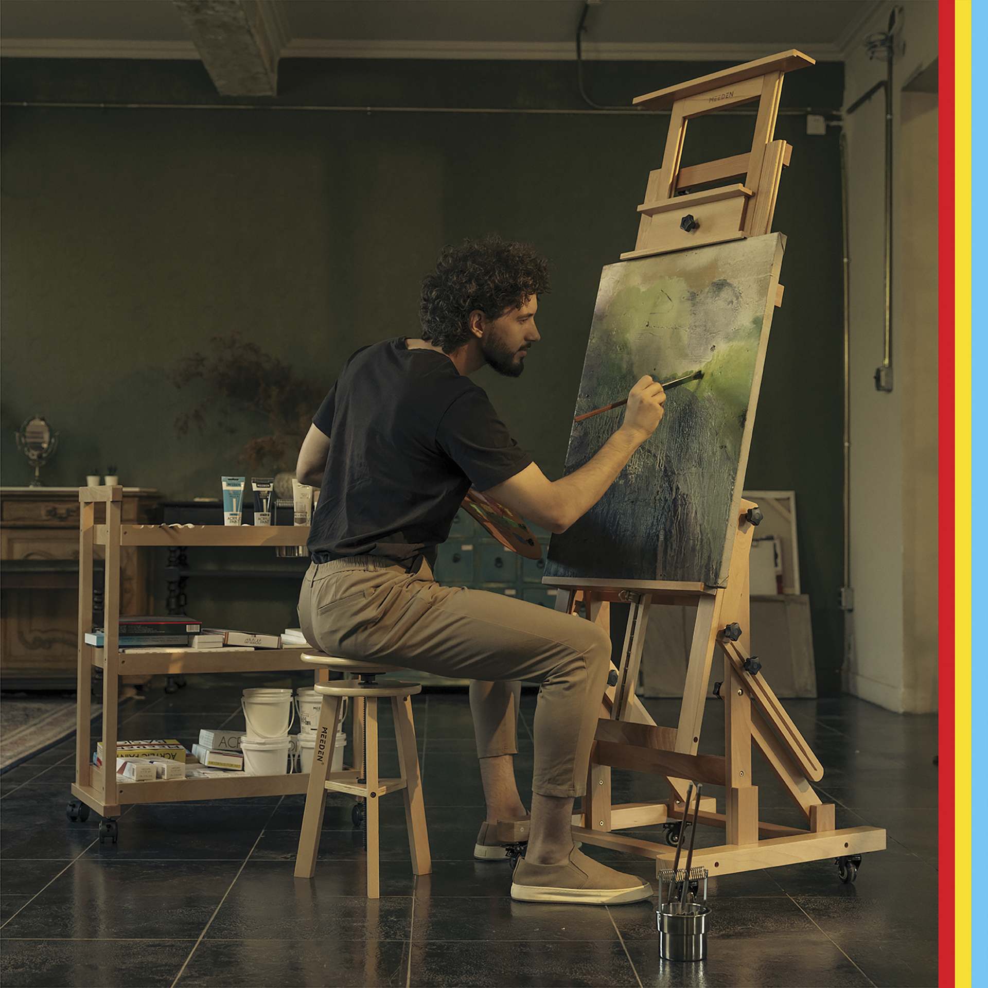 Meeden Deluxe Heavy-Duty Multi-Function Easel - 56" – 118” H - in use in studio (stool sold separately)