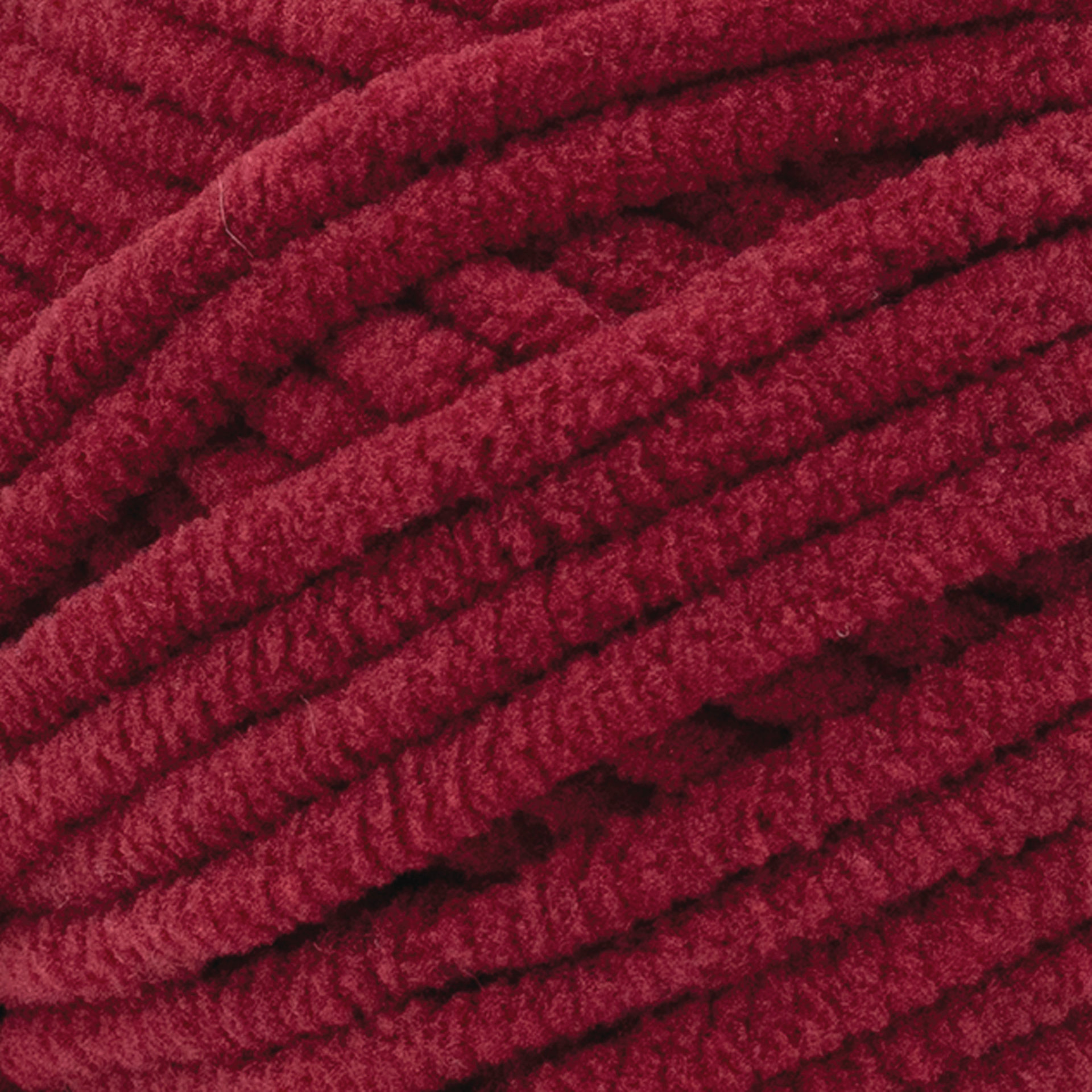 Lion Brand Cover Story Posh Twist Yarn - Pomegranate, 232 yds close up to show texture