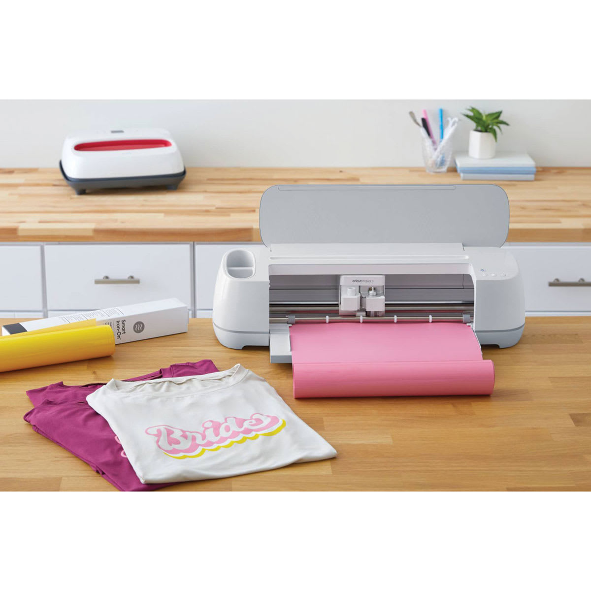 Cricut Smart Iron-On Heat Transfer Vinyl (Sample Smart Iron-On Heat Transfer Vinyl shown with Cricut Maker 3 and sample t-shirts)