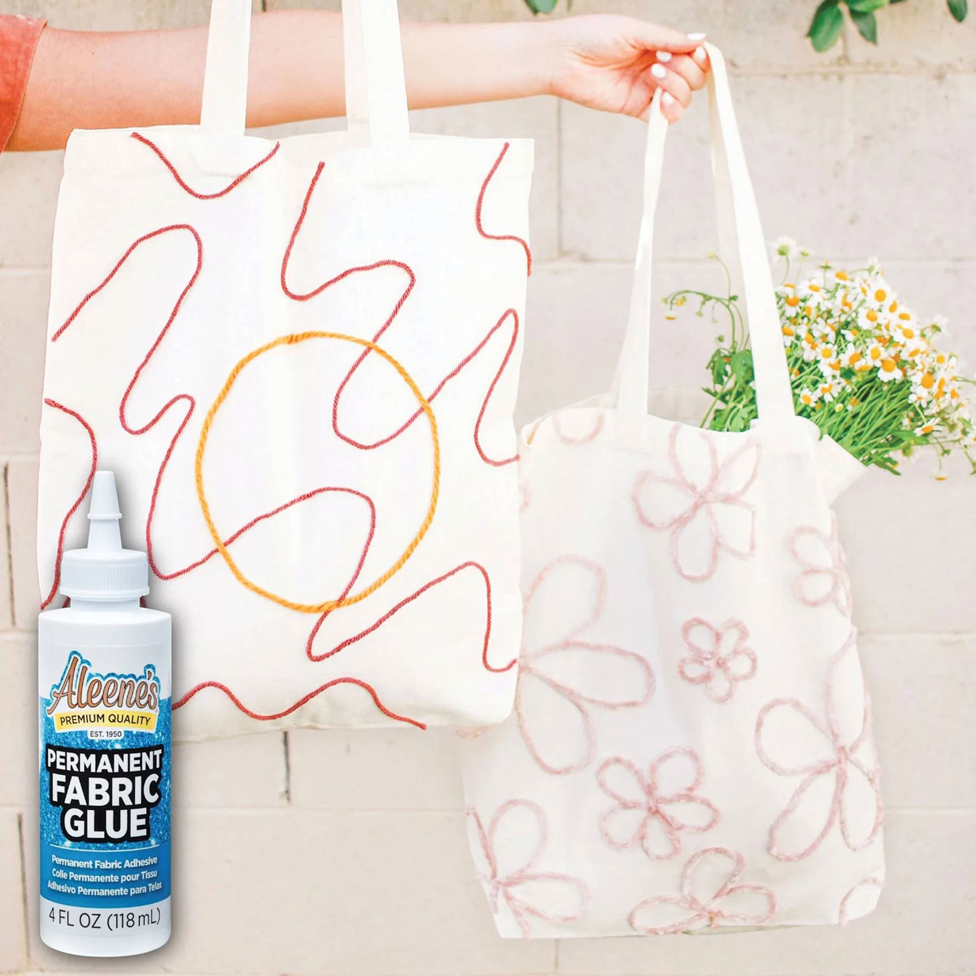 Aleene's Permanent Fabric Glue - 4 oz applied to fabric bag
