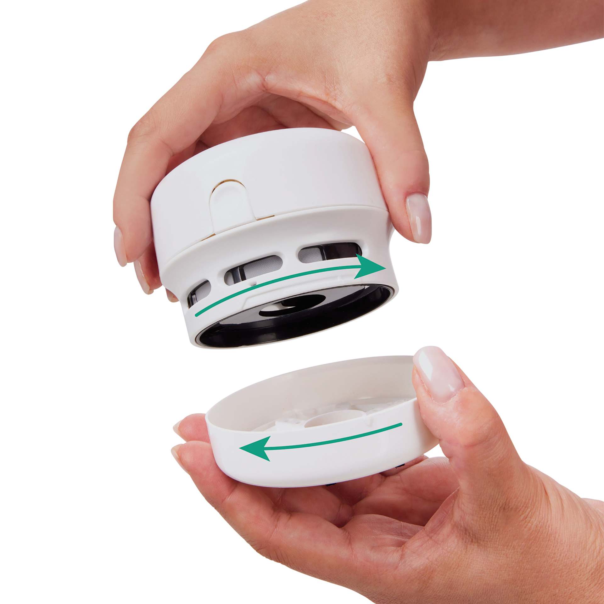 Faber-Castell Creative Studio Artist Desktop Vacuum - White, showing twist to open process Faber-Castell Creative Studio Artist Desktop Vacuum - White, showing twist to open process